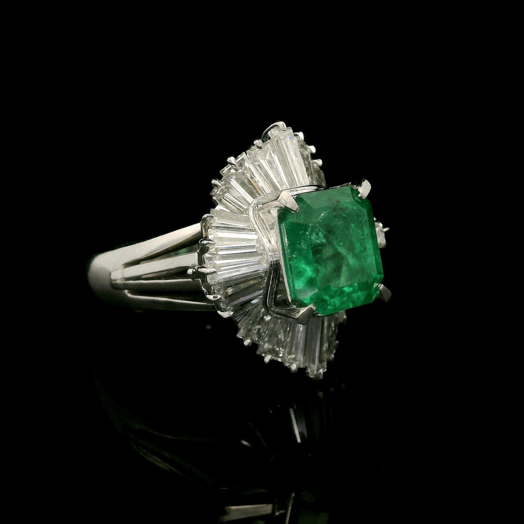--Stone(s):--
(1) Natural Genuine Emerald - Octagonal Step Cut - Prong Set - Vibrant Deep Green Color - Colombian -1.97ct (exact)
** See Certification Details Below for Complete Info ** 
Numerous Natural Genuine Diamonds - Tapered Baguette Cut -