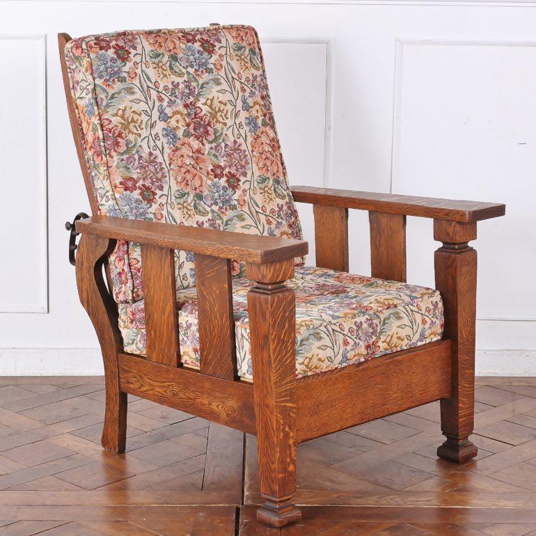 Solid, quarter-sawn oak, Morris chair with an adjustable reclining back. The deep seat, broad arms, and reclining back make this an exceptionally comfortable chair. 



 