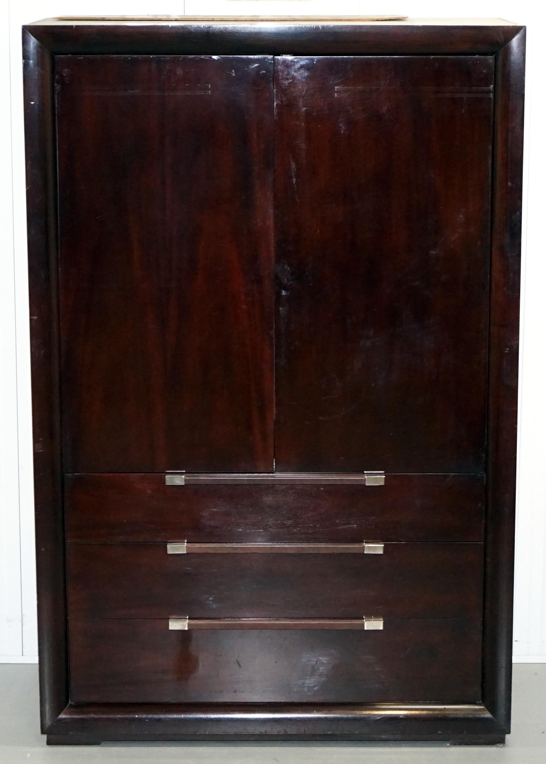 We are delighted to offer for sale this lovely solid Redwood Ralph Lauren Hudson Street wardrobe with drawers and bifold doors

This piece is a monster, its solid Redwood and weighs a tonne, the doors are bi-folding so they retract inside the
