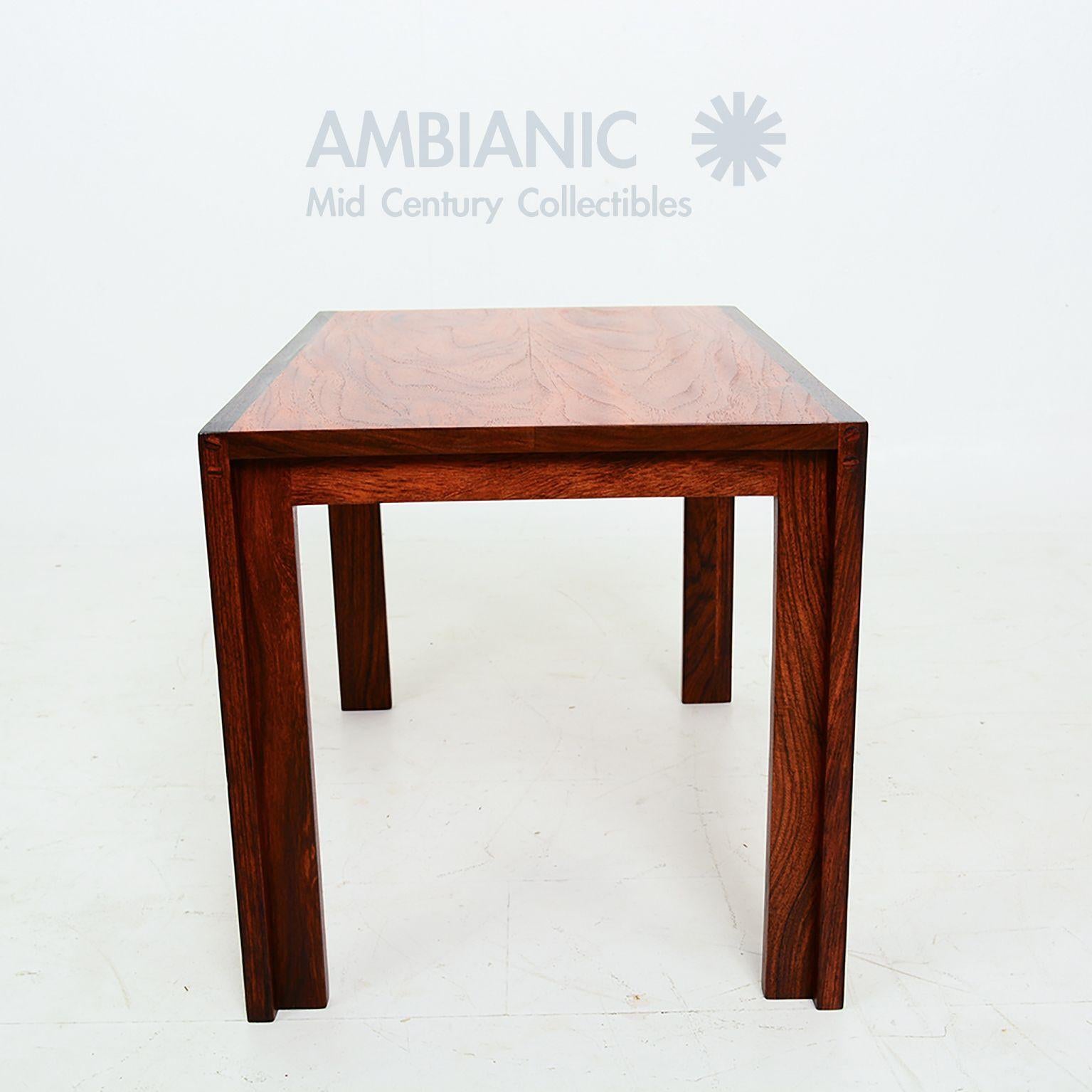 Studio Piece Clean Organic Modern Solid Wood Side Table.
Beautiful grain. George Nakashima style.
Side and legs solid rosewood. The top appears as mahogany.
No markings.
Great quality.
Firm and sturdy. Original preowned vintage condition.
16 in. H x