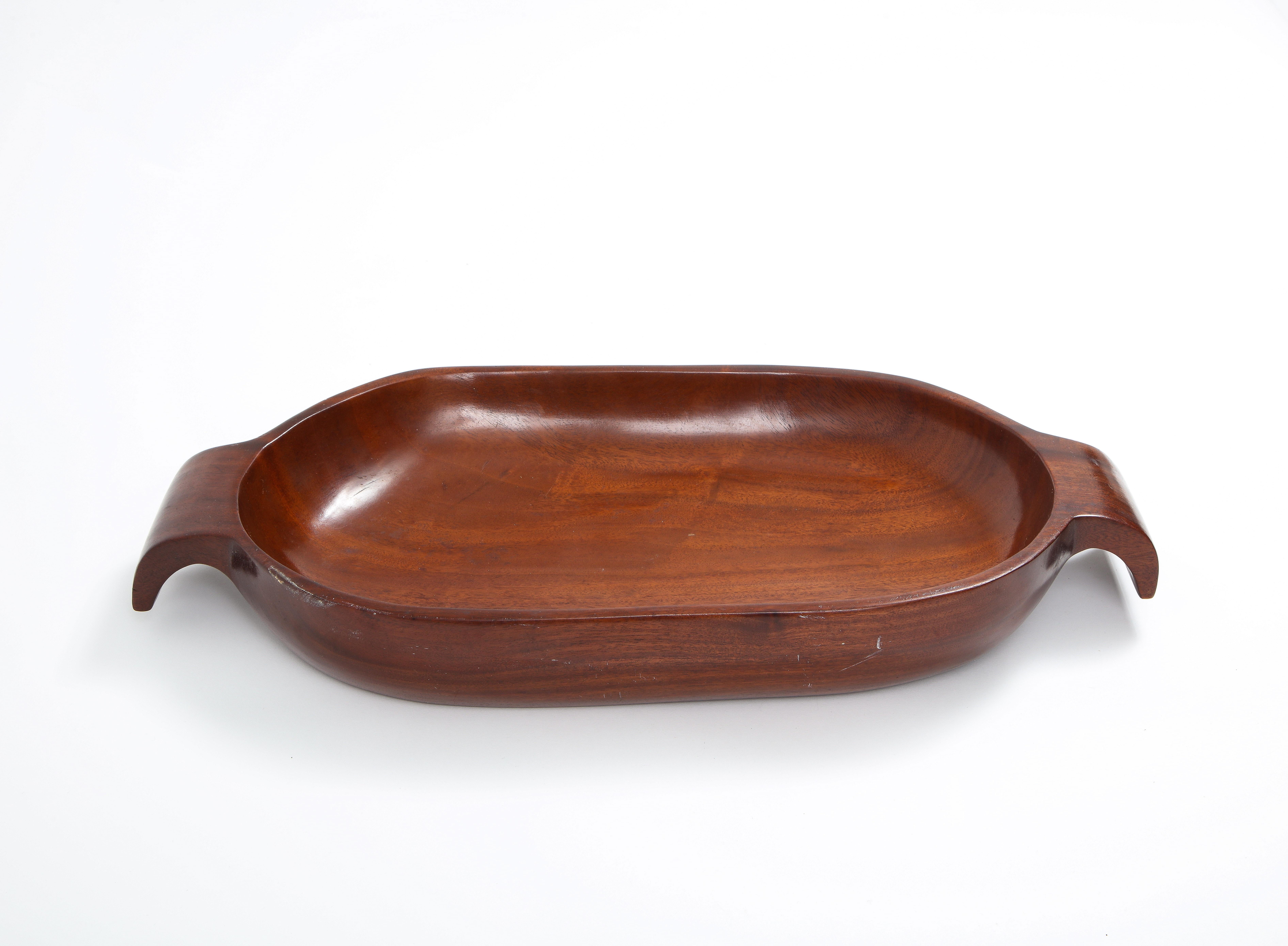 Solid carved Santo Domingo Mahogany tray with handles. The tray has beautiful flowing lines and a great patina and natural polish.