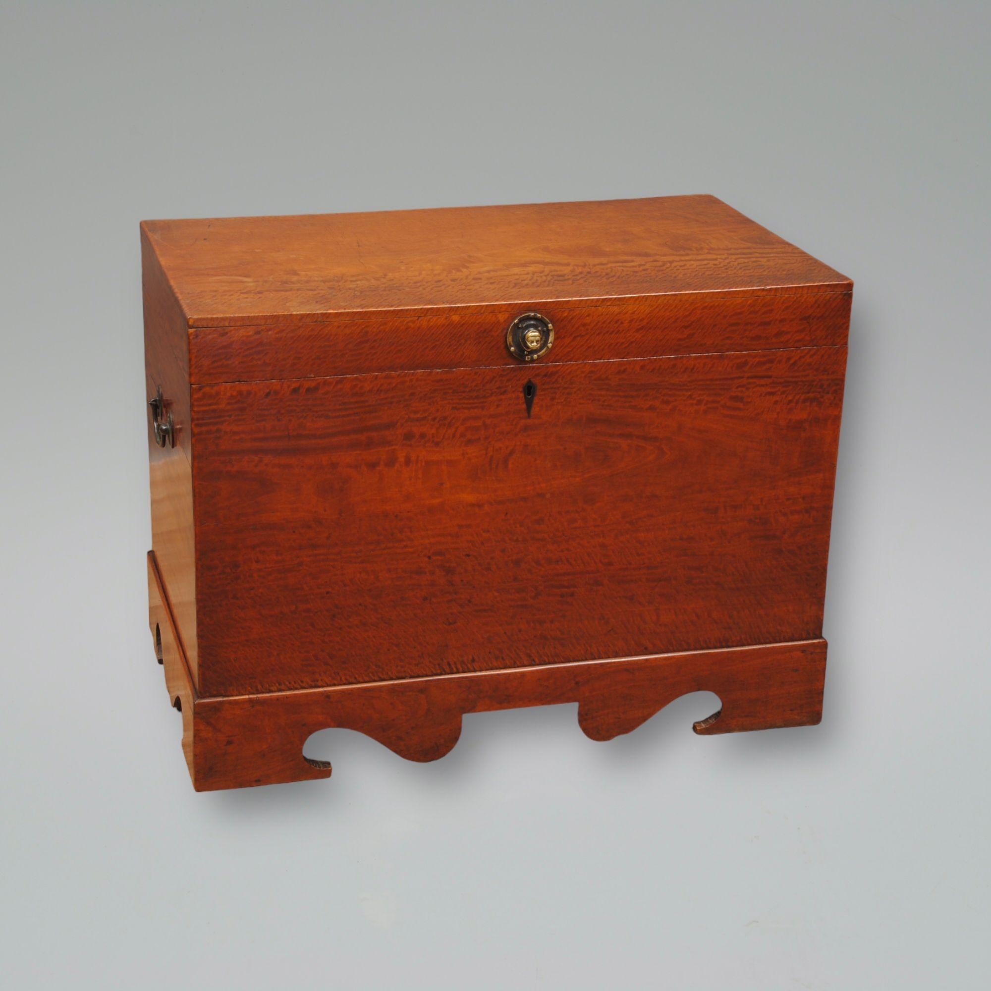 A rare early 19th century solid satinwood anglo indian trunk with brass carrying handles. Superb colour and patination 
