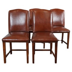 Used Solid set of 4 sheep leather dining room chairs