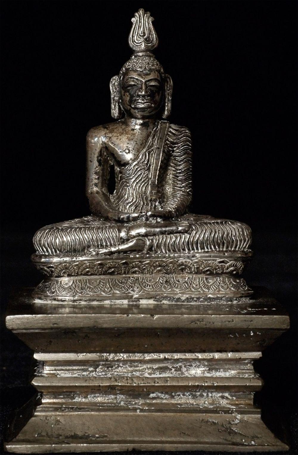 Solid silver 18thC Lankan Buddha on a silver-colored metal base. From the great early 20thC U.S. Mid-West Aseldorf collection (as per previous owner- purchased at an auction of some of the smaller Aseldorf pieces in Chicago at auction in 1990's-many