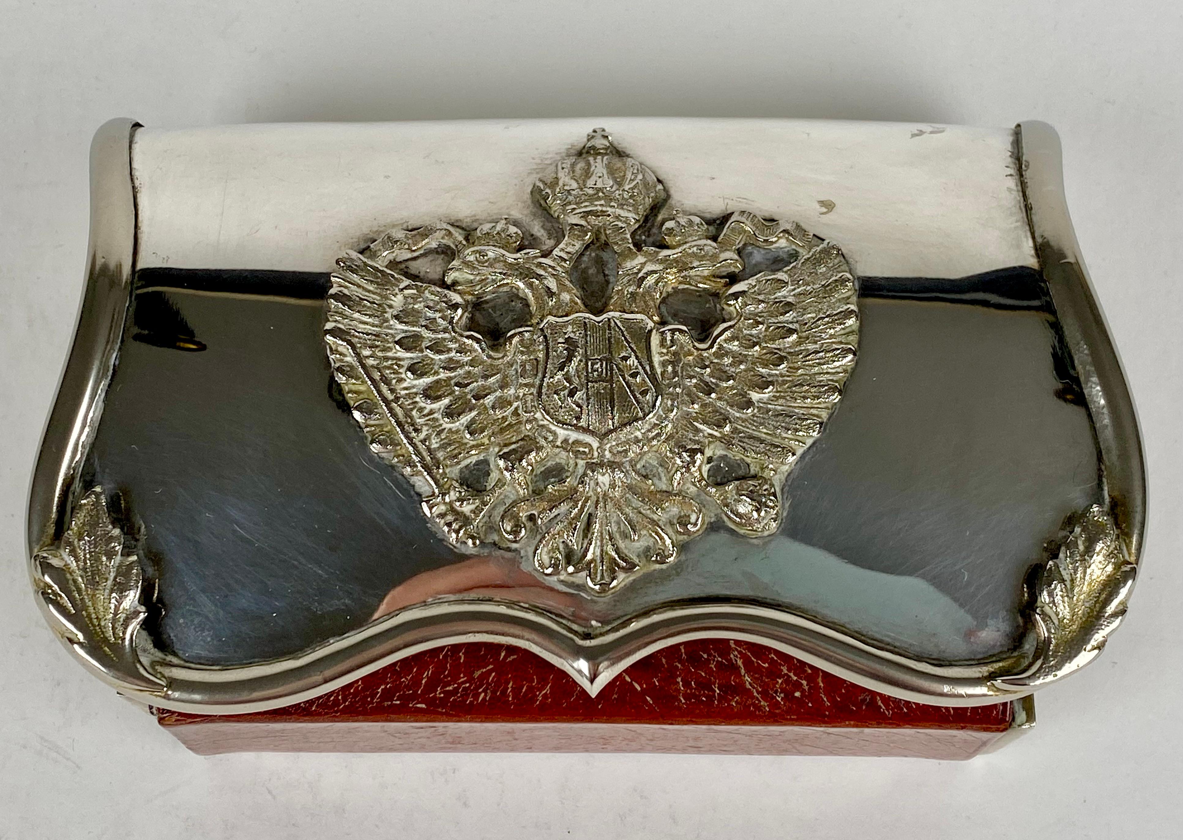 A solid silver cartridge box for a cavalry officer.
Decorated with a double breaded eagle under a regal crown.
Fully hallmarked to the lid circa 1900 
Austo Hungarian Empire 
Length 15 cm 
Width 10cm 