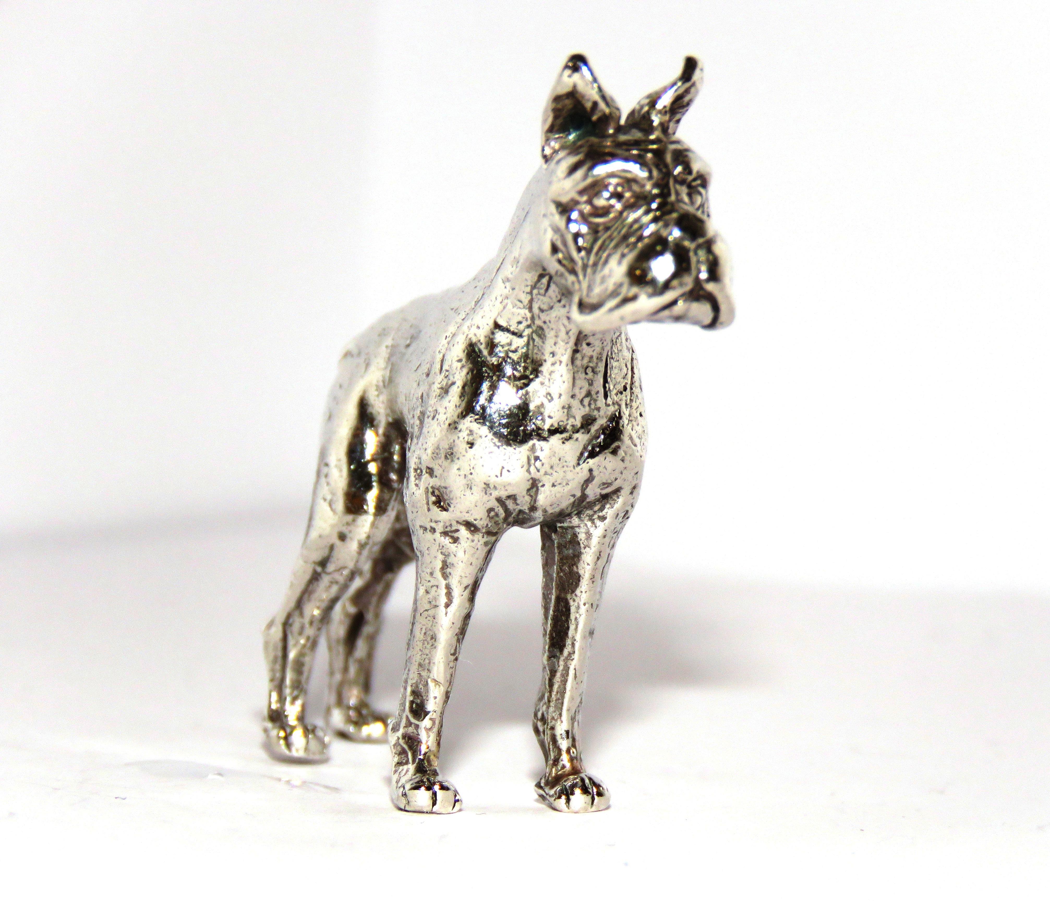 silver dog statue