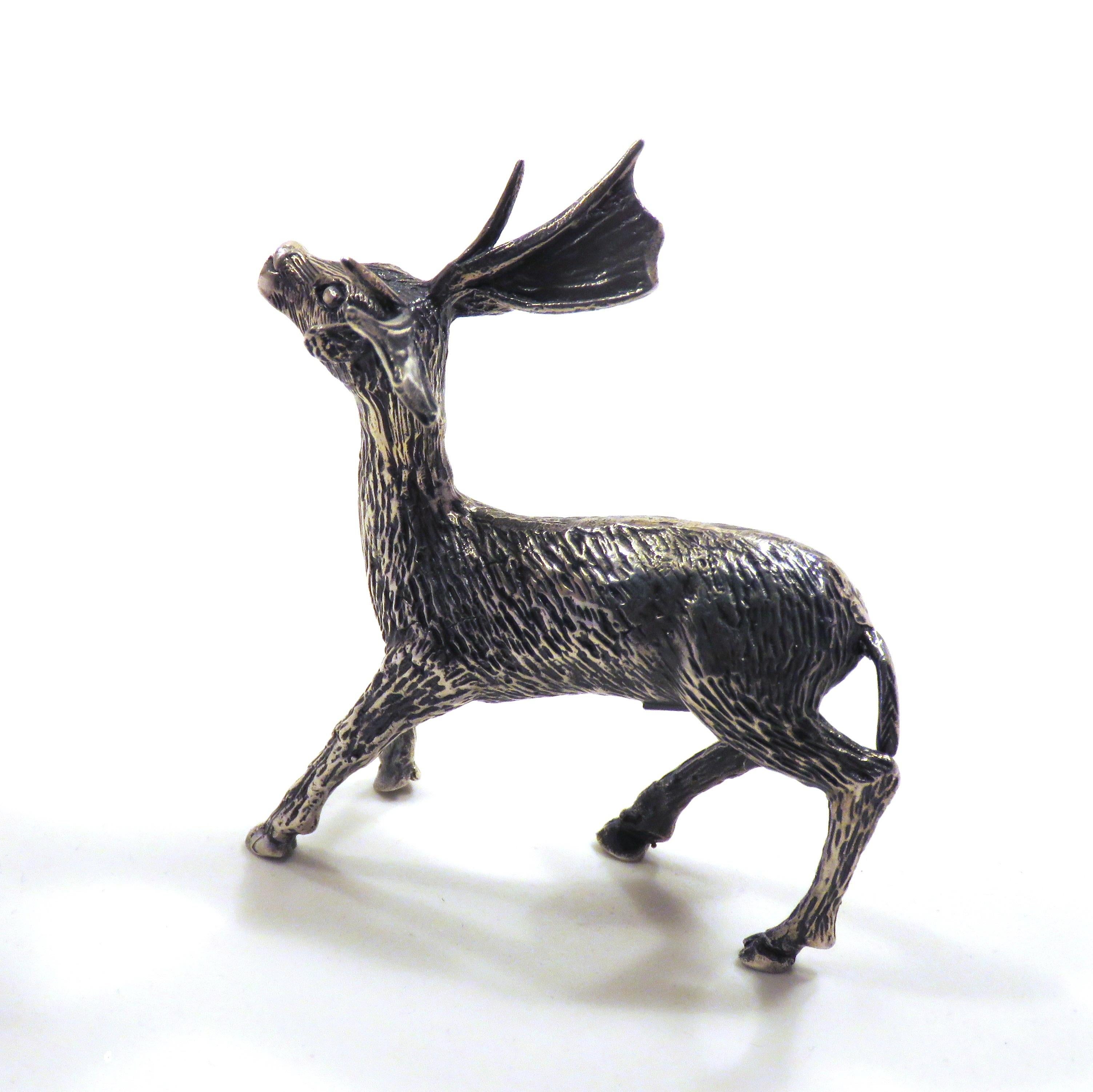 Solid silver fallow deer, in very good vintage condition.
Dimensions: Height 68 mm / 2.67 inches - Length 66 mm / 2.59 inches - Weight 45 grams.
It  is stamped with the Silver Italian Mark 800 - 59AR SOA SOCIETA' ORAFA ARENTINA - AREZZO -