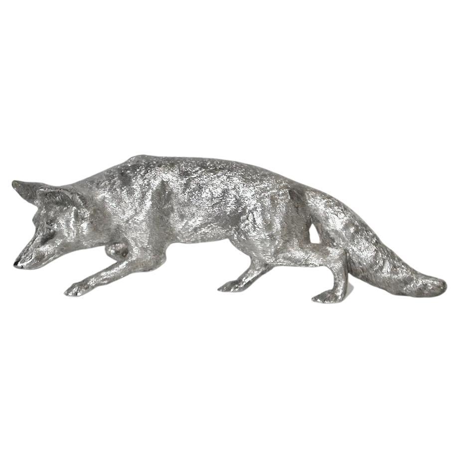 Solid Silver Fox, Dated 1987,Mappin & Webb,London.
This realistic model of a fox on the prowl is cast silver.
The texture of the fur is beautifully hand carved.
Weight 7.14 Troy Ounces