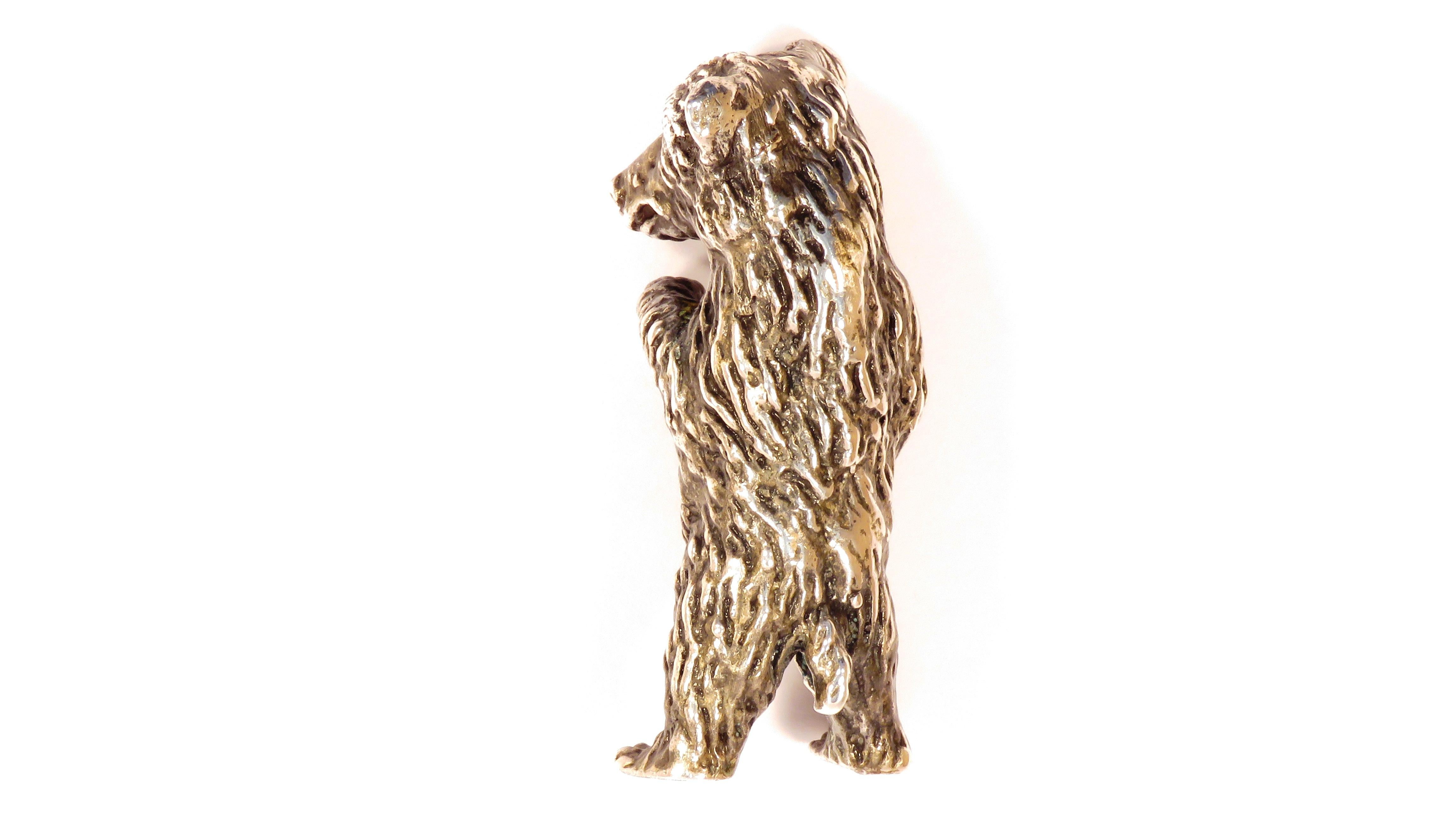 Solid silver bear in very good vintage condition.
Dimensions: Height 64 mm / 2.519 inches - Length 24 mm / 0.944 inches - Weight 62 grams.
It  is stamped with the Silver Italian Mark 800 - AR  - AREZZO -