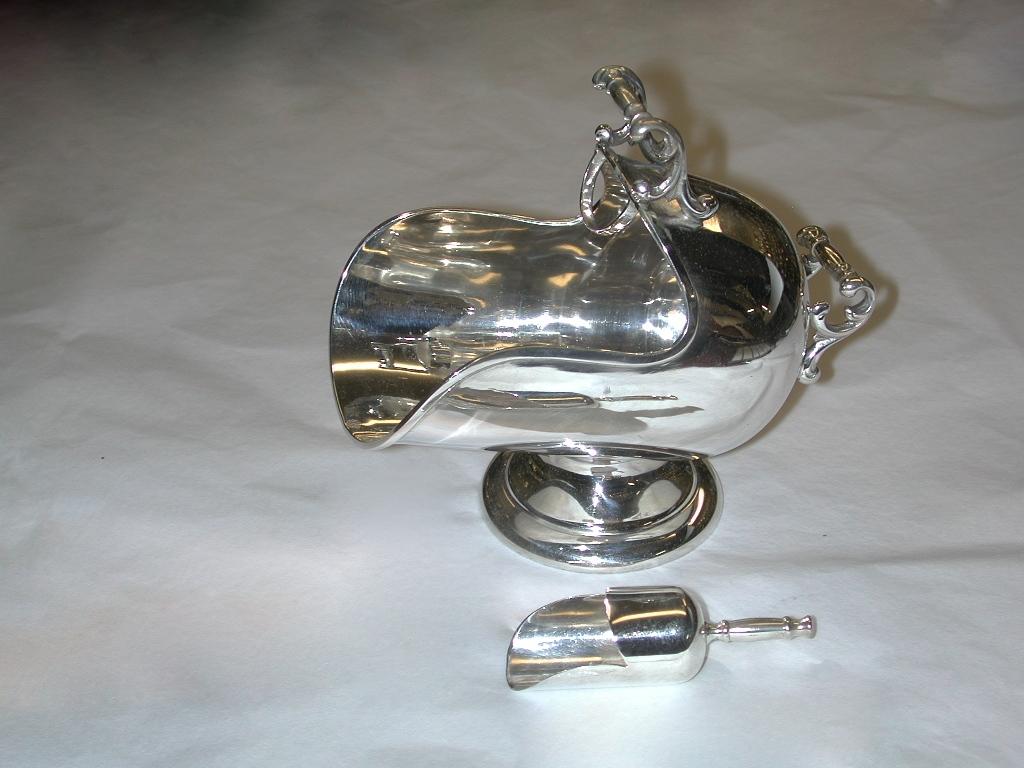 Spanish silver sugar container in the shape of a miniature coal scuttle.
Made of 915 standard silver.
