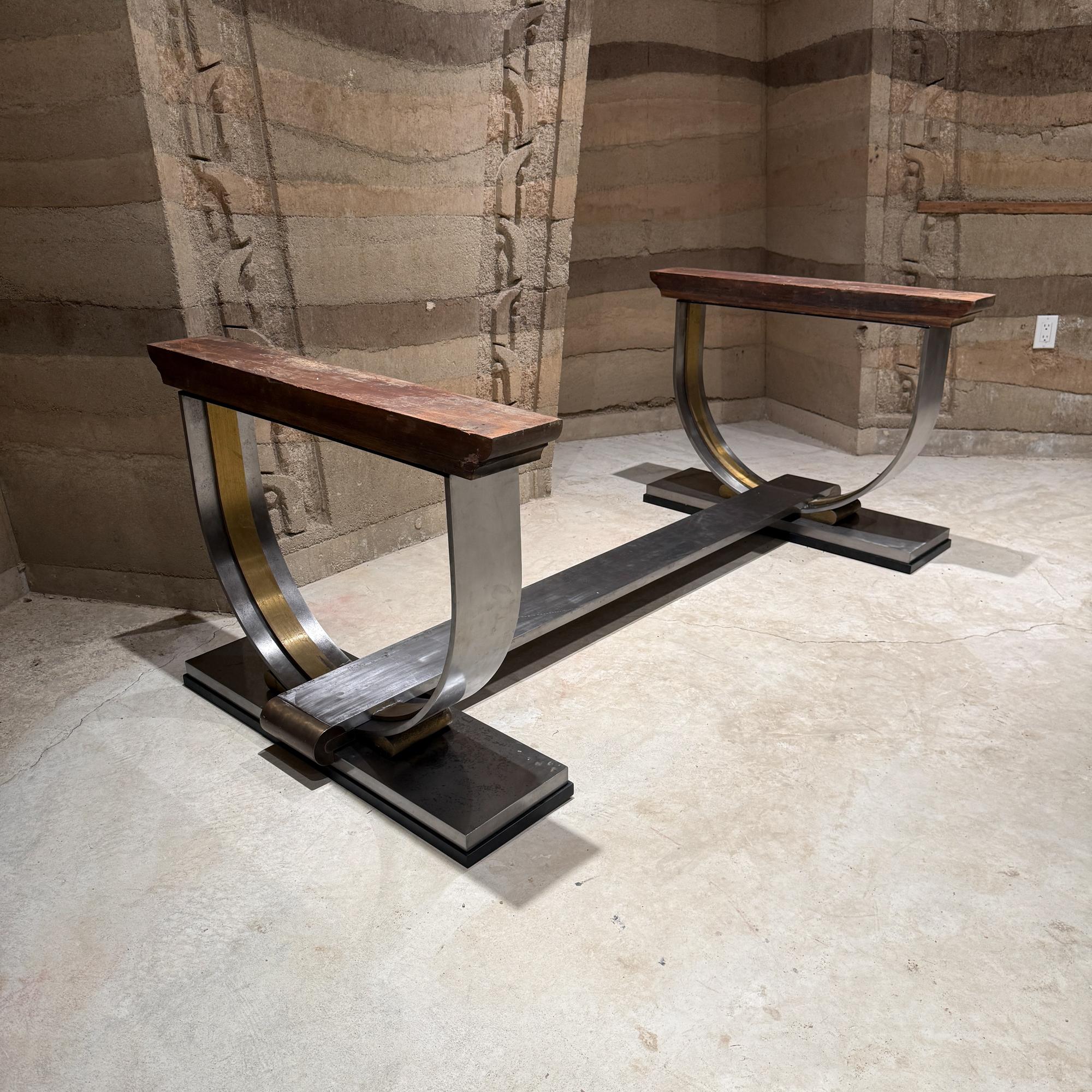 For your consideration, Custom Bronze Solid Steel dining table base attributed to Arturo Pani Mexico 1960s. Dramatic presentation of wood brass bronze and steel.
Horseshoe base connected by Solid Steel bar.
Listing is for base only.  No glass