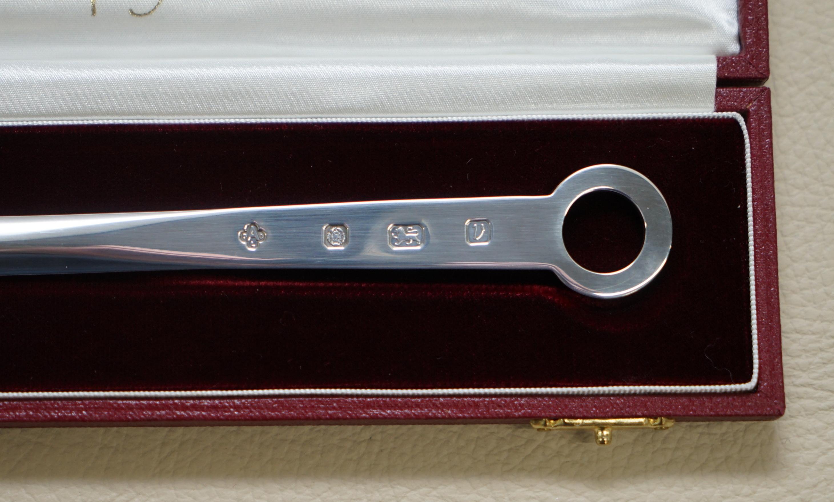 We delighted to offer for sale this lovely 1995 original boxed Asprey London solid sterling silver letter opener

A well made and nicely presented piece in solid sterling, its fully hallmarked to one side which is as follows, A PLC for Asprey, the