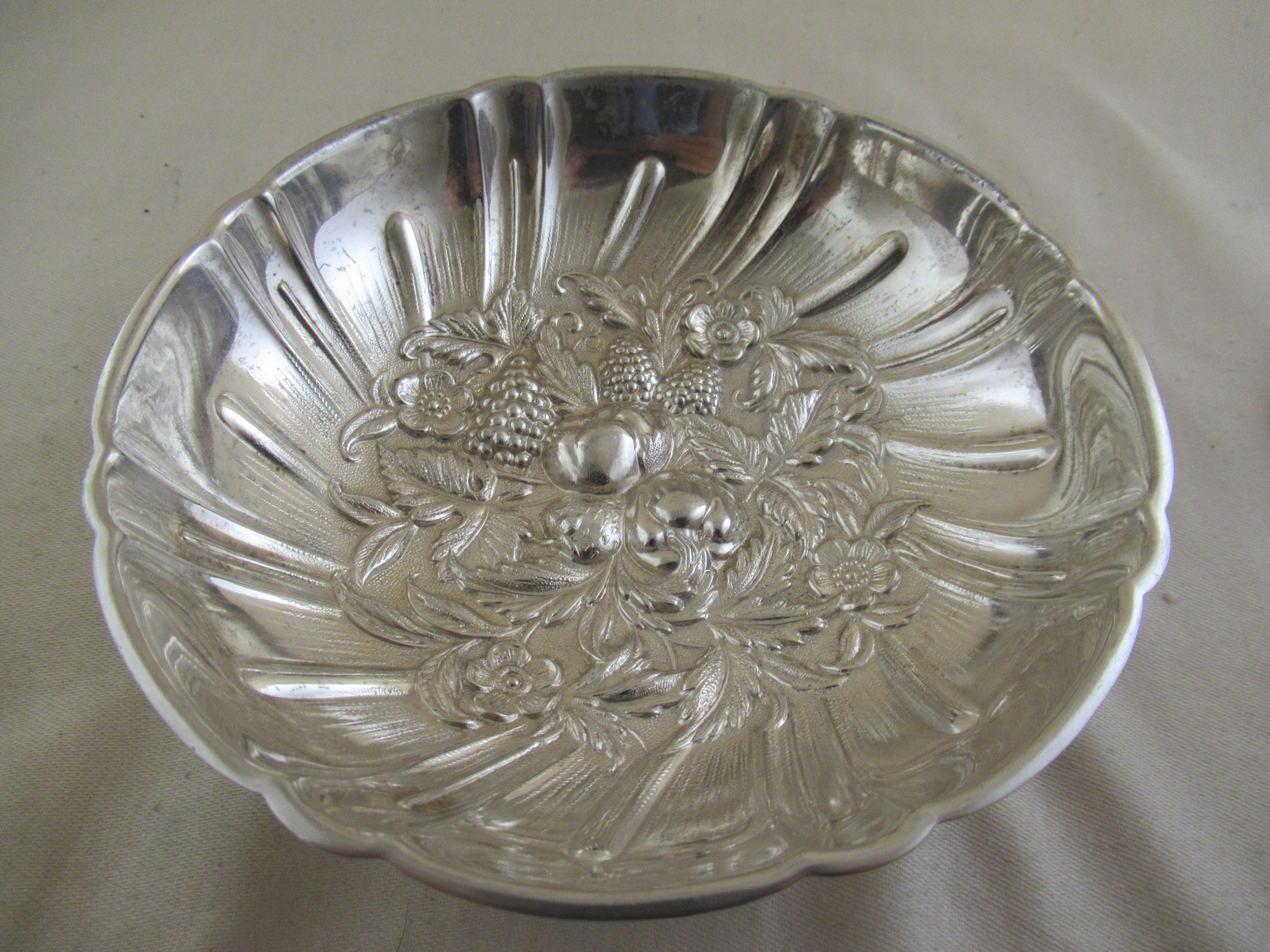 Solid Sterling Silver Repousse sweetmeat dish & matching spoon
Made by S.KIRK & SONS of BALTIMORE, MARYLAND
--------------
A superb, round dish with a turned edge all round the sides to give extra strength. 
Repoussé decorated in the base with