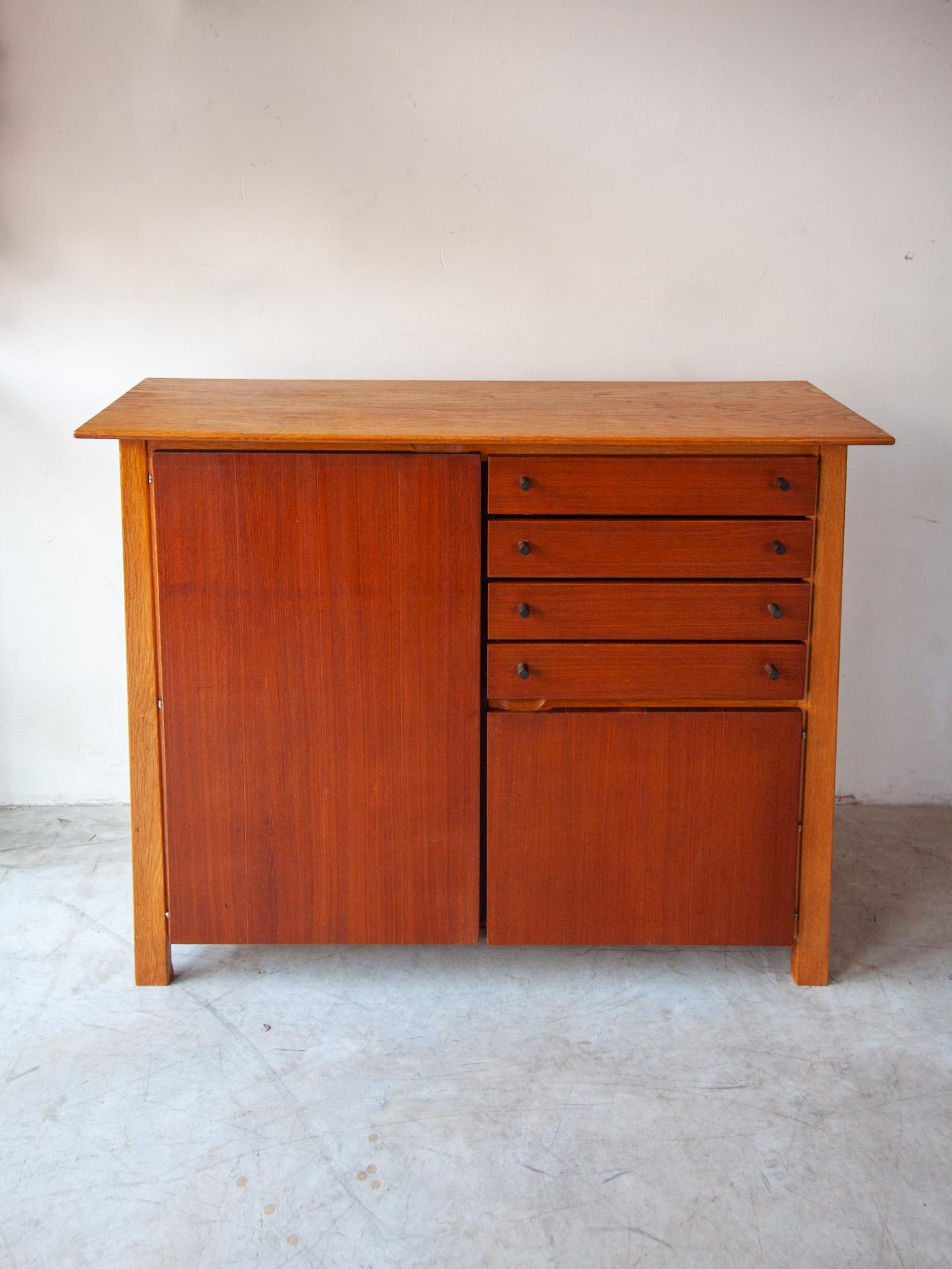 Mid-Century Modern cabinet with drawers, bar sideboard insight and dark accent teak, Denmark, designed 1961.
Dimensions:Width 130cm-Dept 42 cm- Height 102 cm