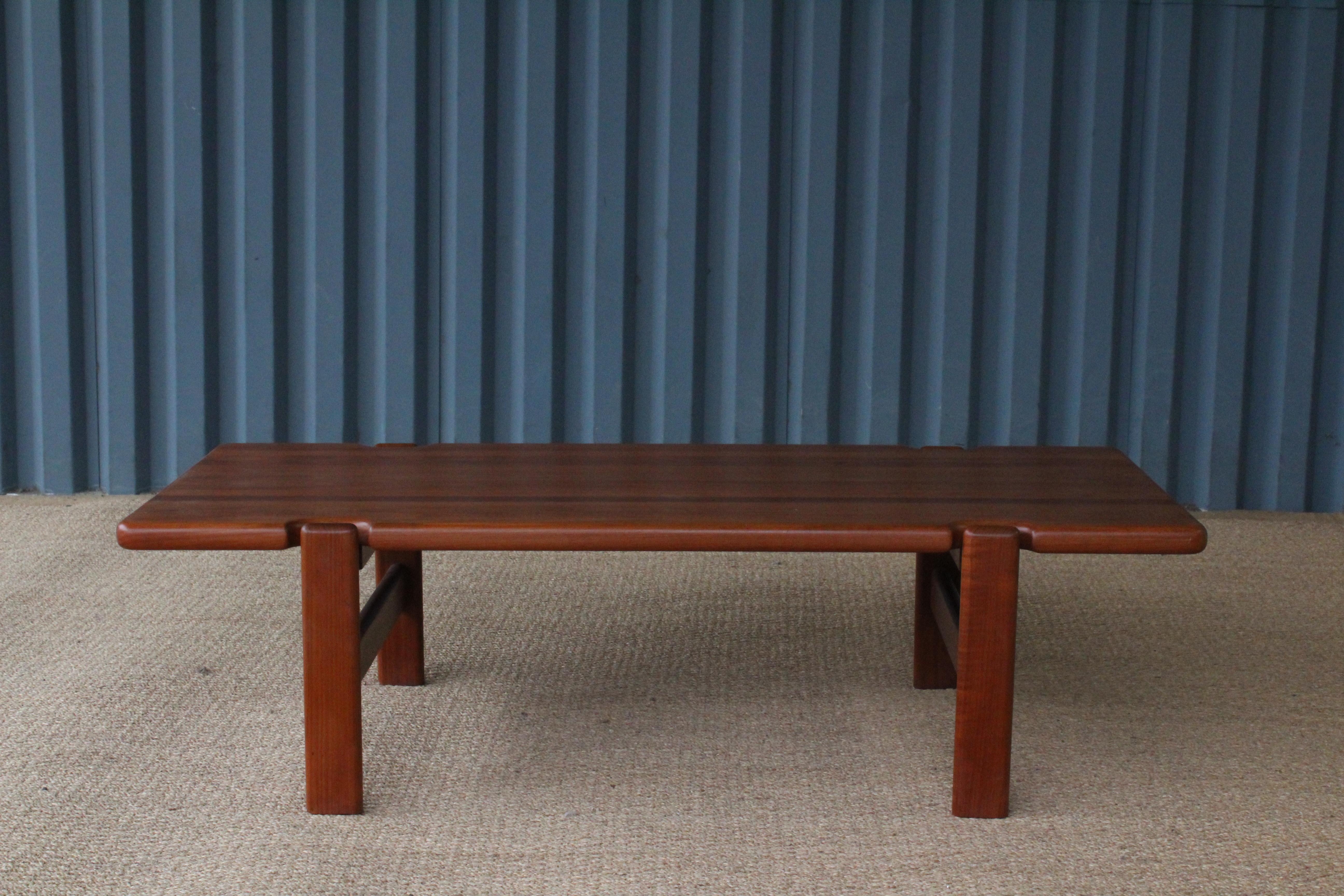 Solid teak 1960s coffee table from Denmark. Designed by Niels Bach. Top has been refinished.