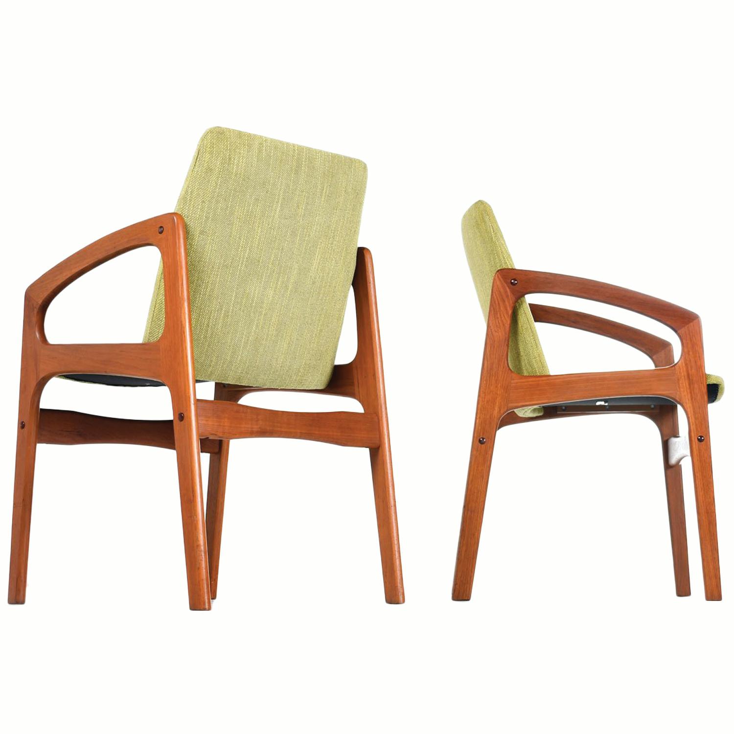 Our set of two vintage modern Danish armchairs has been updated with new green upholstery. The brilliant grass green fabric is perfectly suited for Mid-Century Modern theme decor. The chairs are crafted of solid teak, Danish modern design but made
