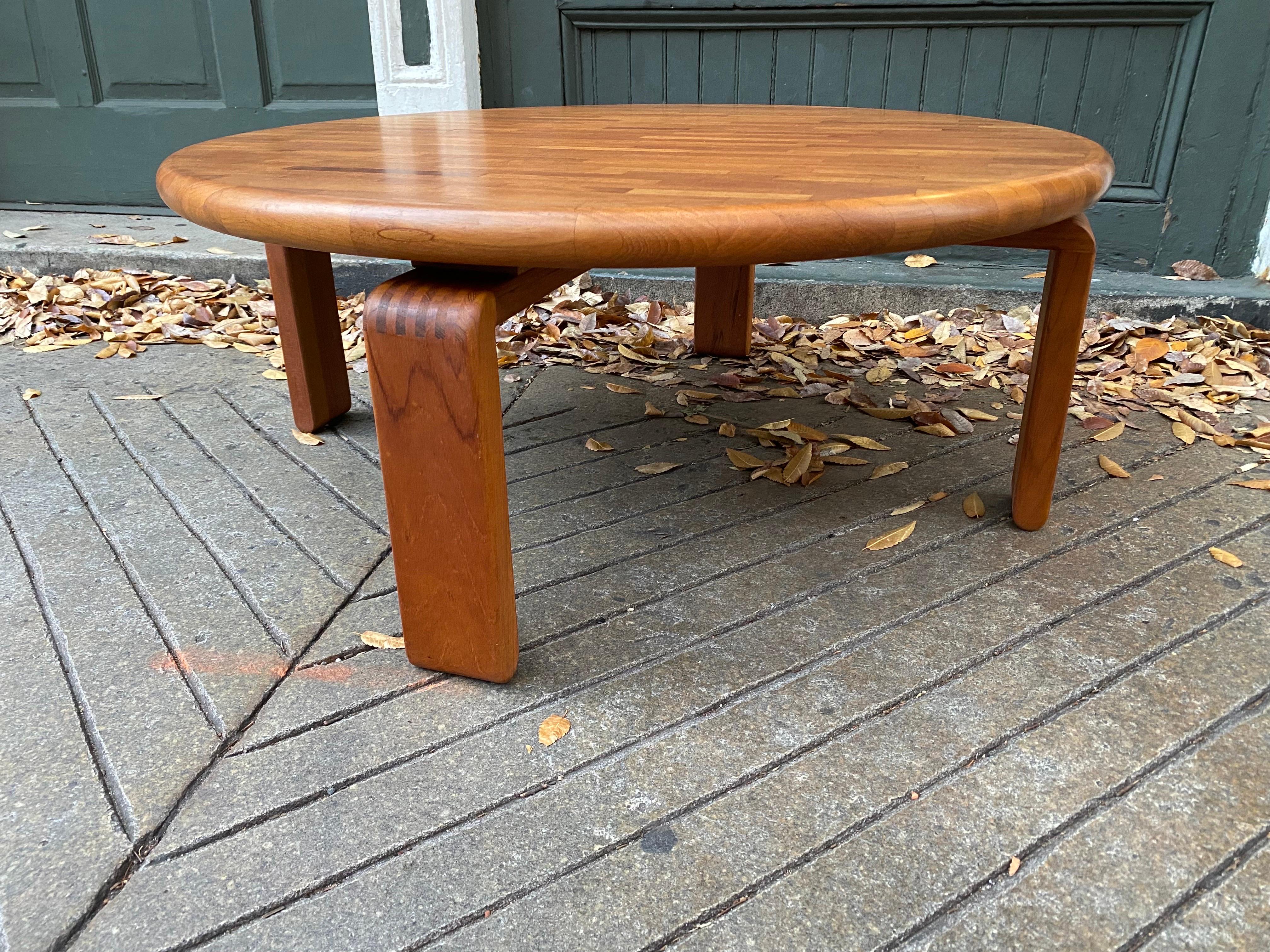 SOLID Teak Coffee Table!  Butcher Block Design made up of Solid Teak Pieces.  Dove-tailed legs also in Solid Wood.  Outstanding quality!  Original condition and ready to go!  This table is solid as a rock!  Good weight!