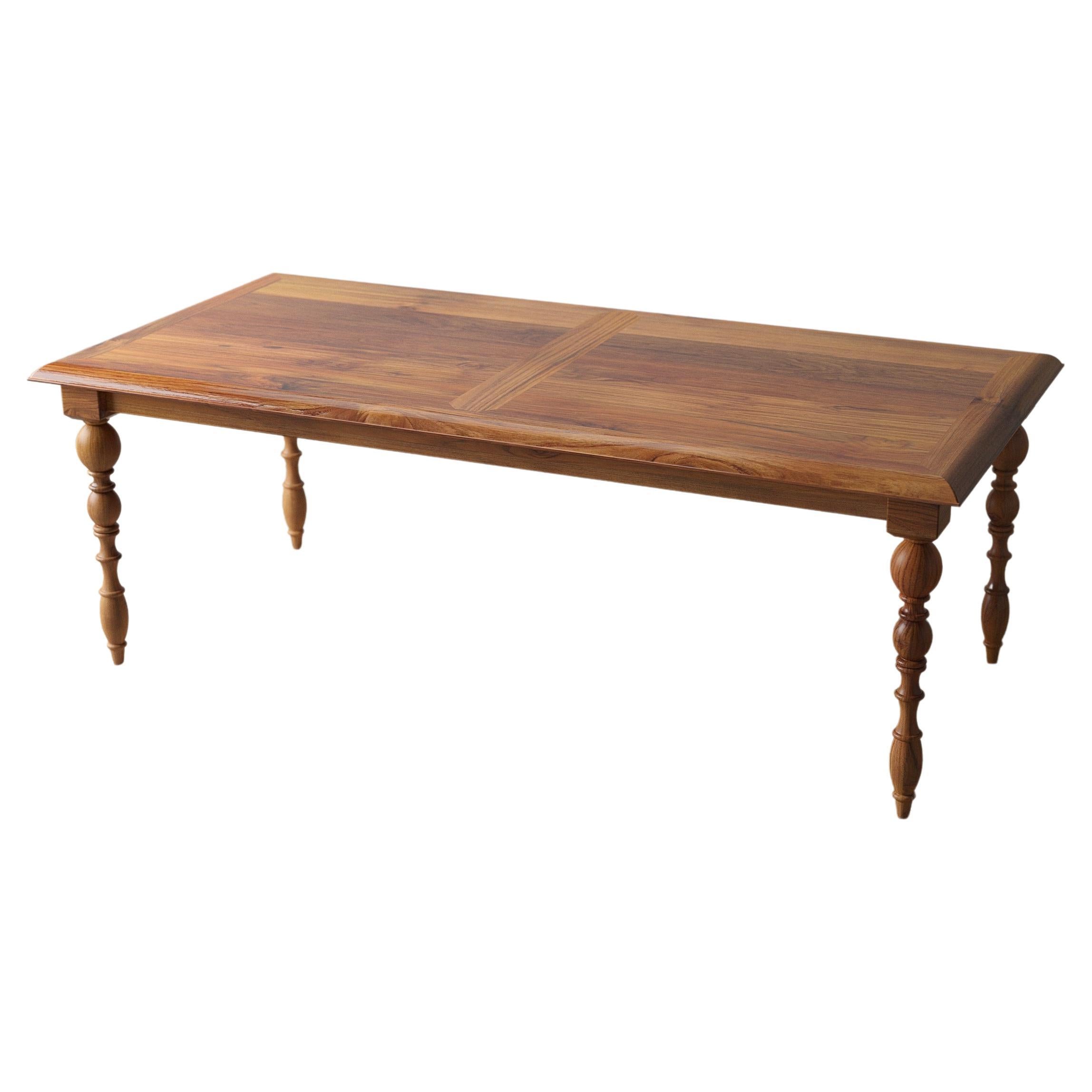 Solid Teak Handcrafted Dining Table in a Smooth Natural Finish For Sale