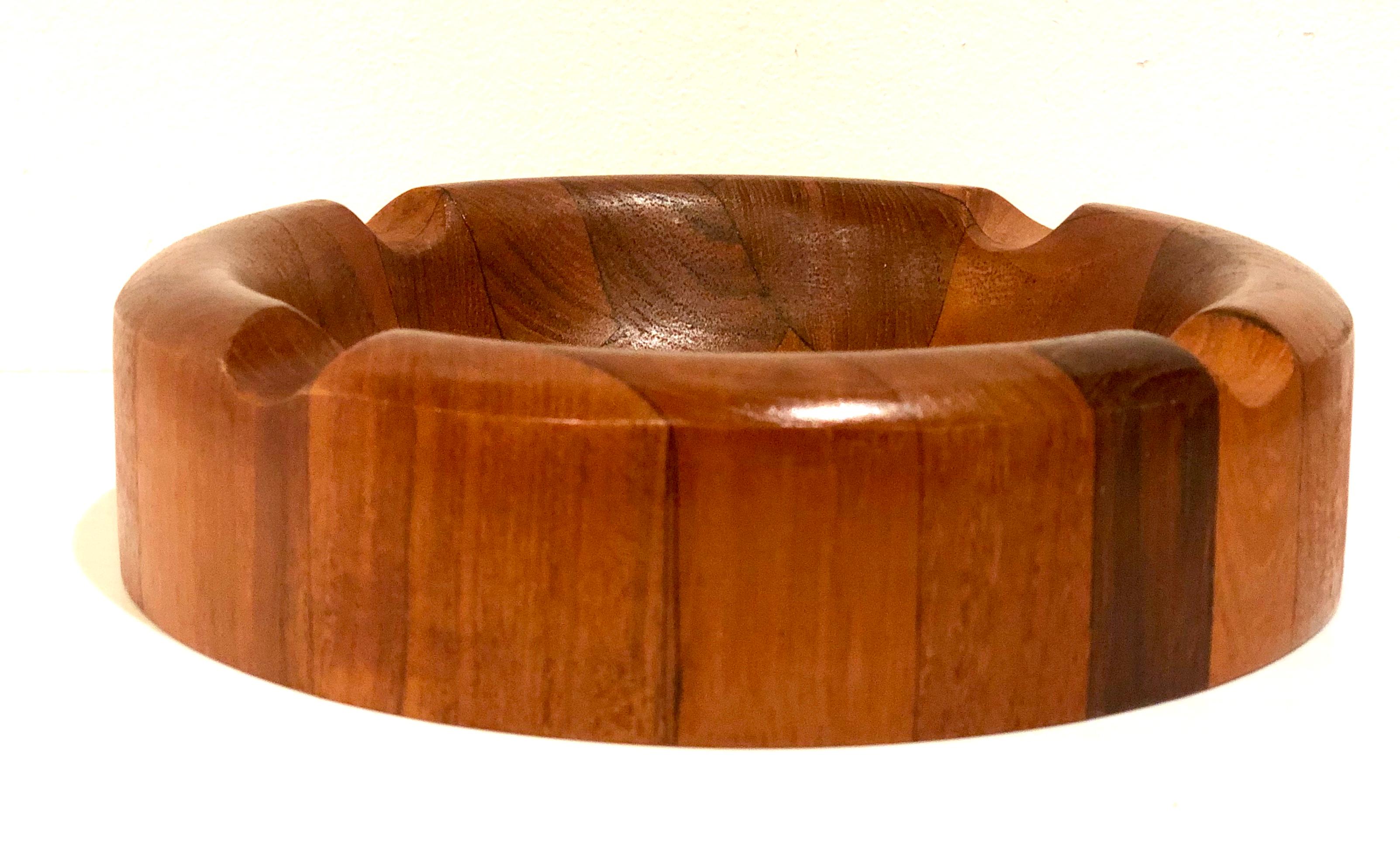Beautiful and unique cigar ashtray in solid teak handcrafted by Atapco circa 1970s in great condition.