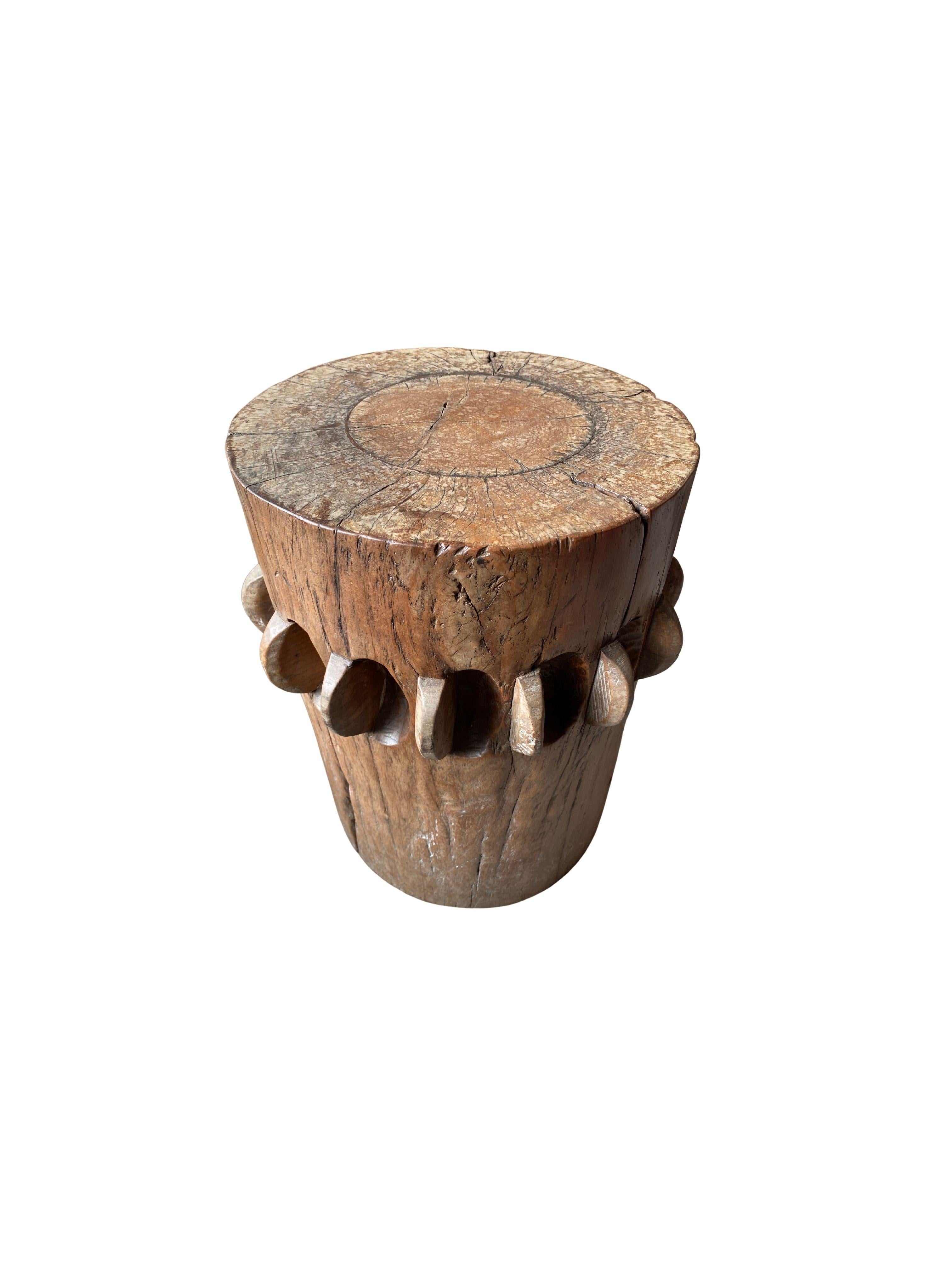 This solid crusher was part of a larger sugar cane press extracting the sugar rich juices from harvested sugar cane. Hand-carved from teak It has a smooth finish and would make for a wonderful pedestal, side table or as a sculptural object on