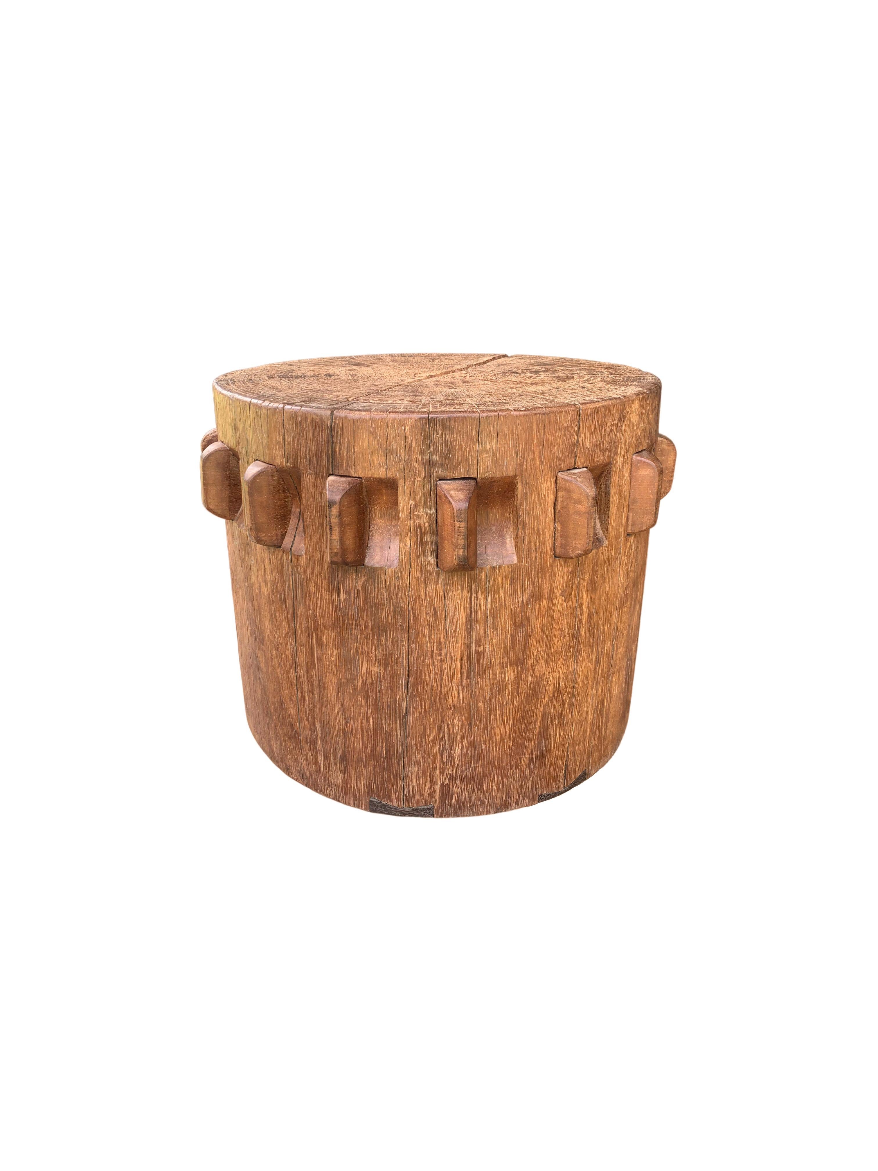 This solid crusher was part of a larger sugar cane press extracting the sugar rich juices from harvested sugar cane. Hand-carved from teak It has a smooth finish and would make for a wonderful pedestal, side table or as a sculptural object on