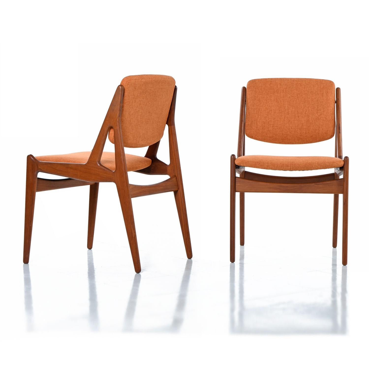 Set of six Mid-Century Modern Danish solid teak dining chairs designed by Arne Vodder for Vamo Sonderborg. The chairs have been restored with all new high quality, burnt orange woven tweed upholstery matching original factory spec. The fabric is age