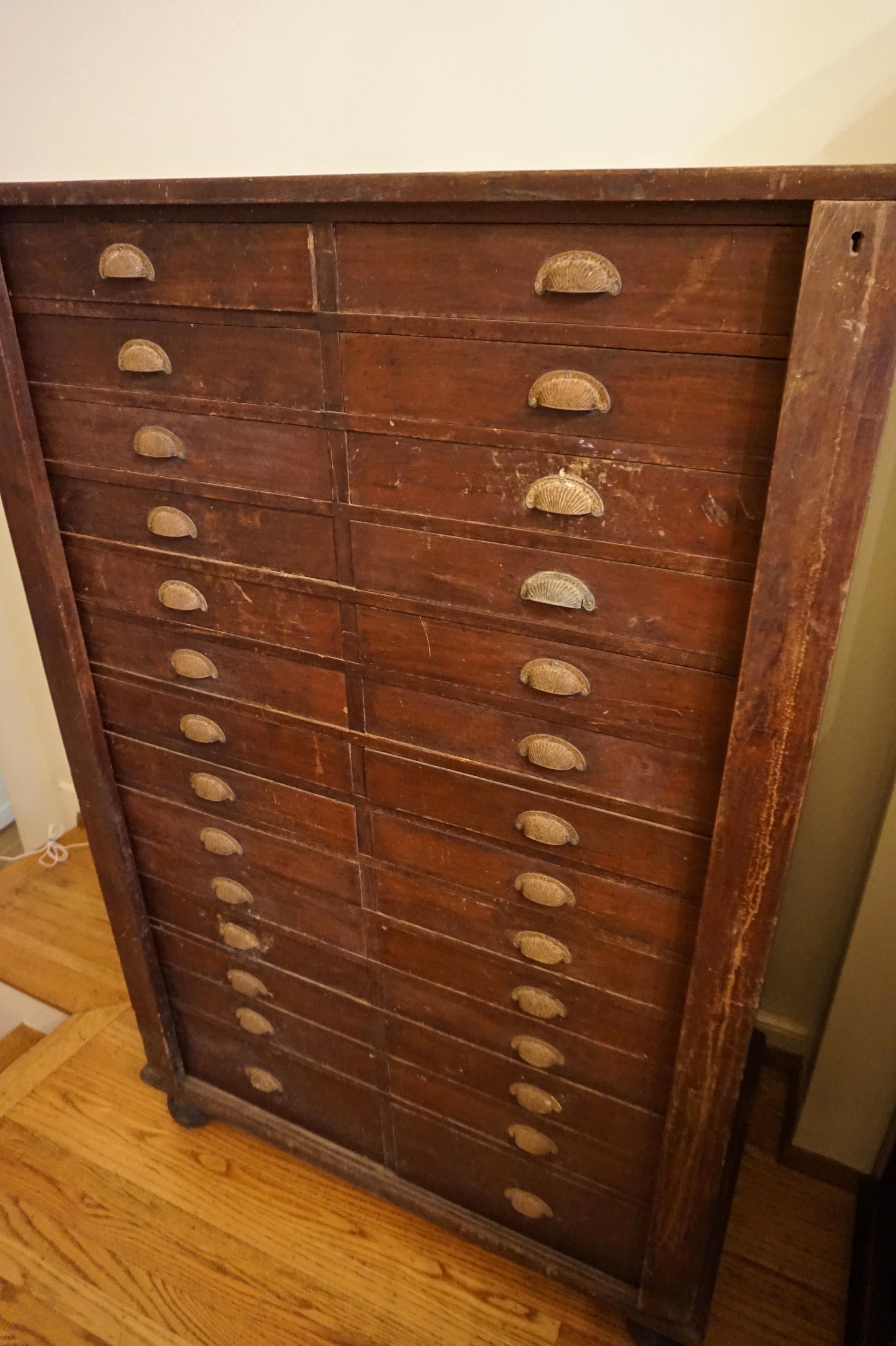 British Colonial Teak Filing Apothecary Cabinet wt Metal Pulls & Lock Mechanism In Good Condition For Sale In Vancouver, British Columbia