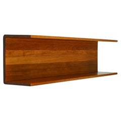 Solid teak wall shelf, 1960s Germany.