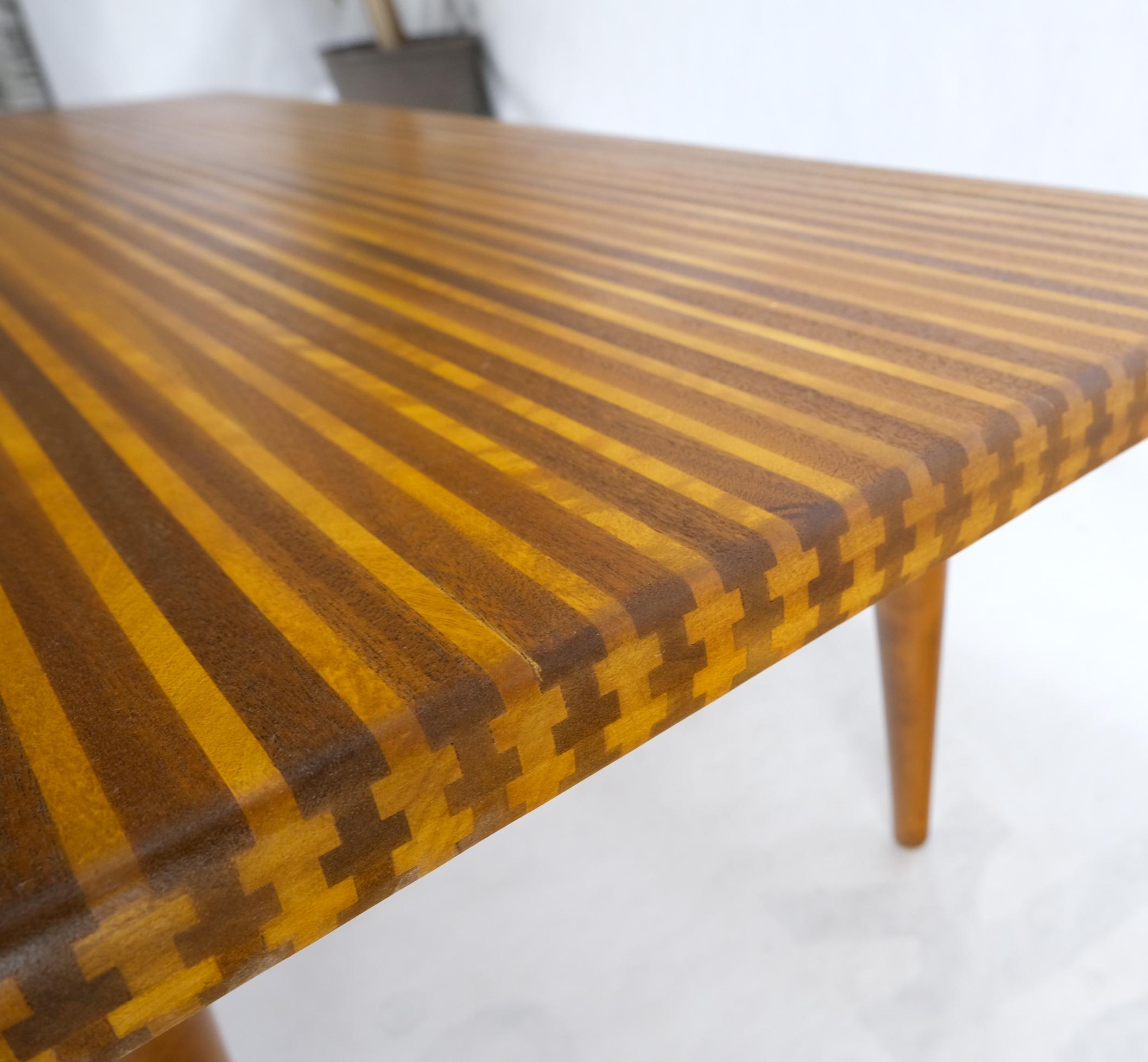 Solid teak & walnut Block Swedish coffee table on tapered dowel legs mint.
Beautiful two tone 
