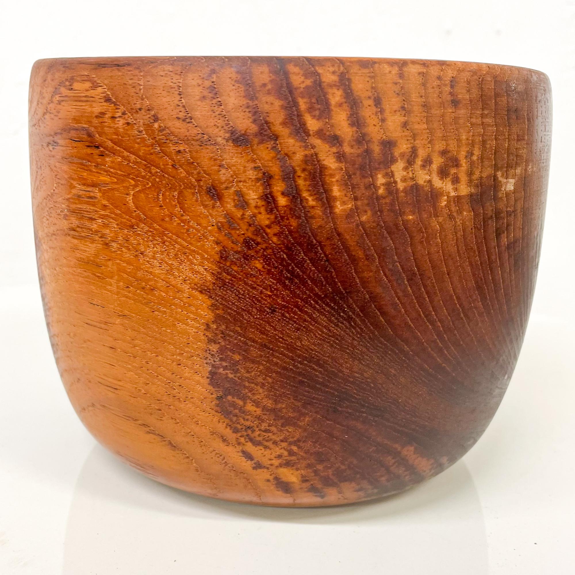 For your consideration a modern bowl made of solid teak wood. Sculptural shape. Stamped underneath with maker information (Only half of the stamp is visible). 
Made in Sweden. Circa the late 1950s.

Good condition, gently used. Refer to images.