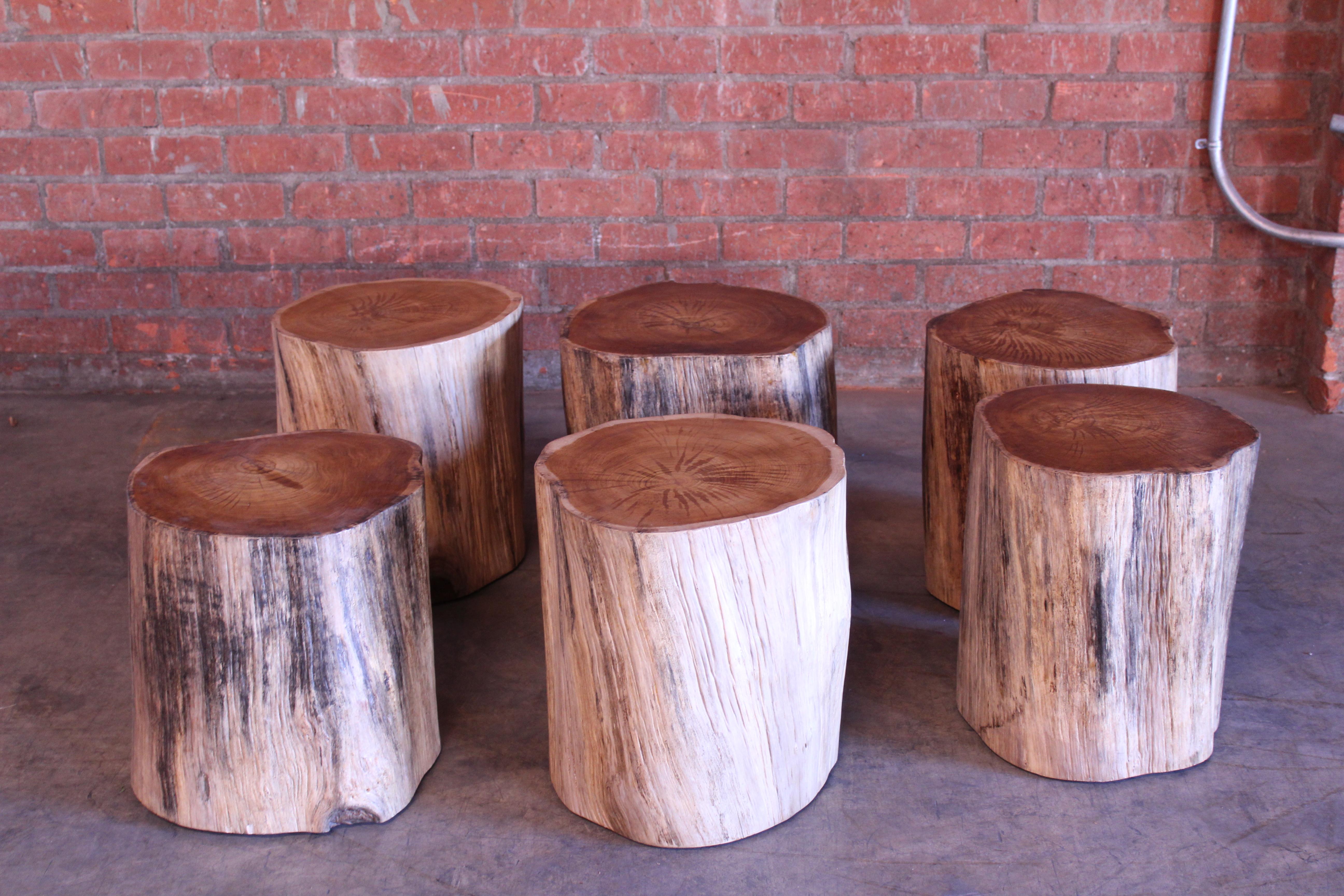 Solid teak wood stump tables. Heavy weight. Sold individually. Roughly 17 diameter and 18 inches high.