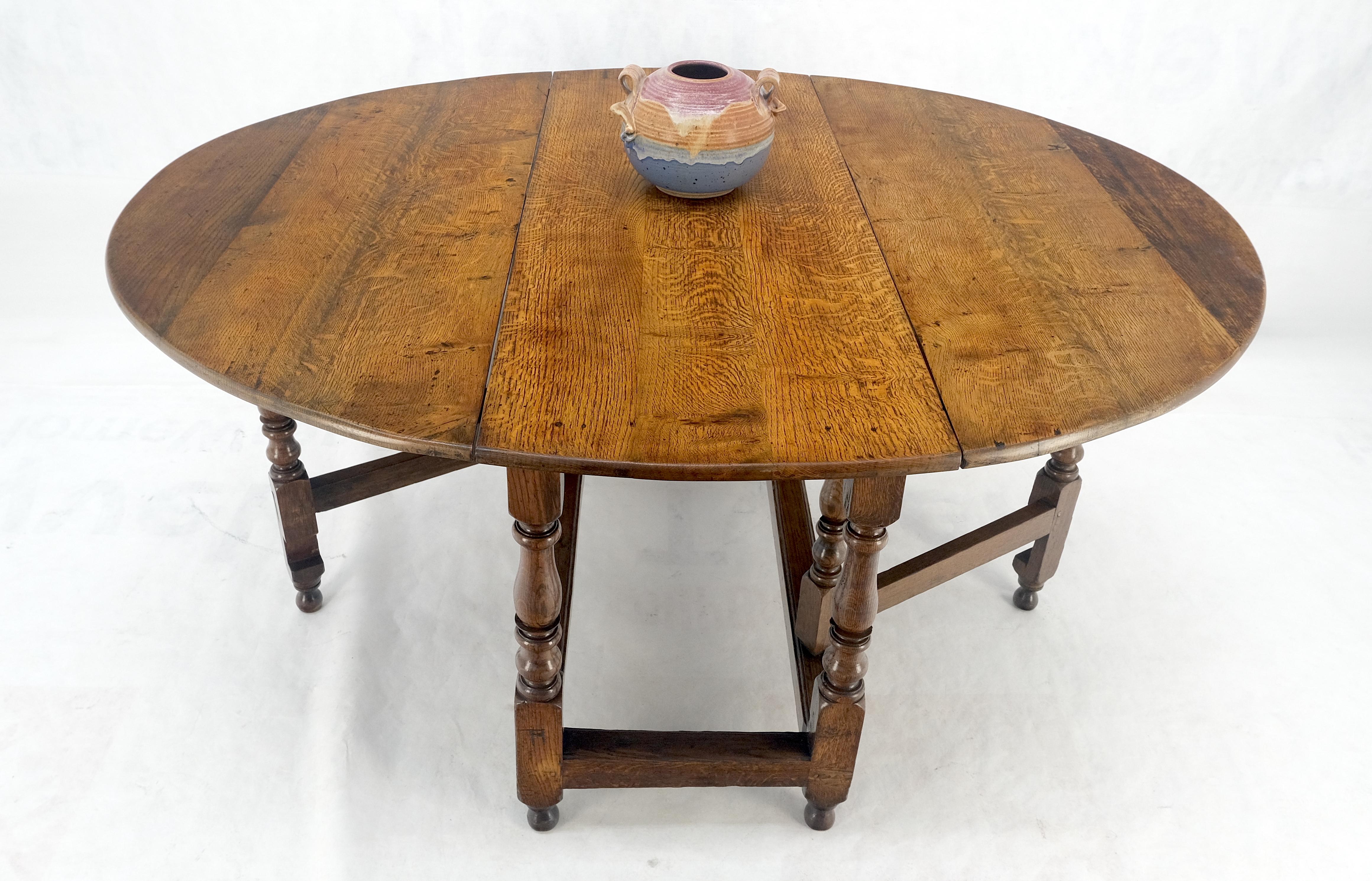 Mesa de Comedor con Pata de Portón de Hoja Abatible Ovalada de Roble Tigre Macizo ¡Limpia! en venta 5