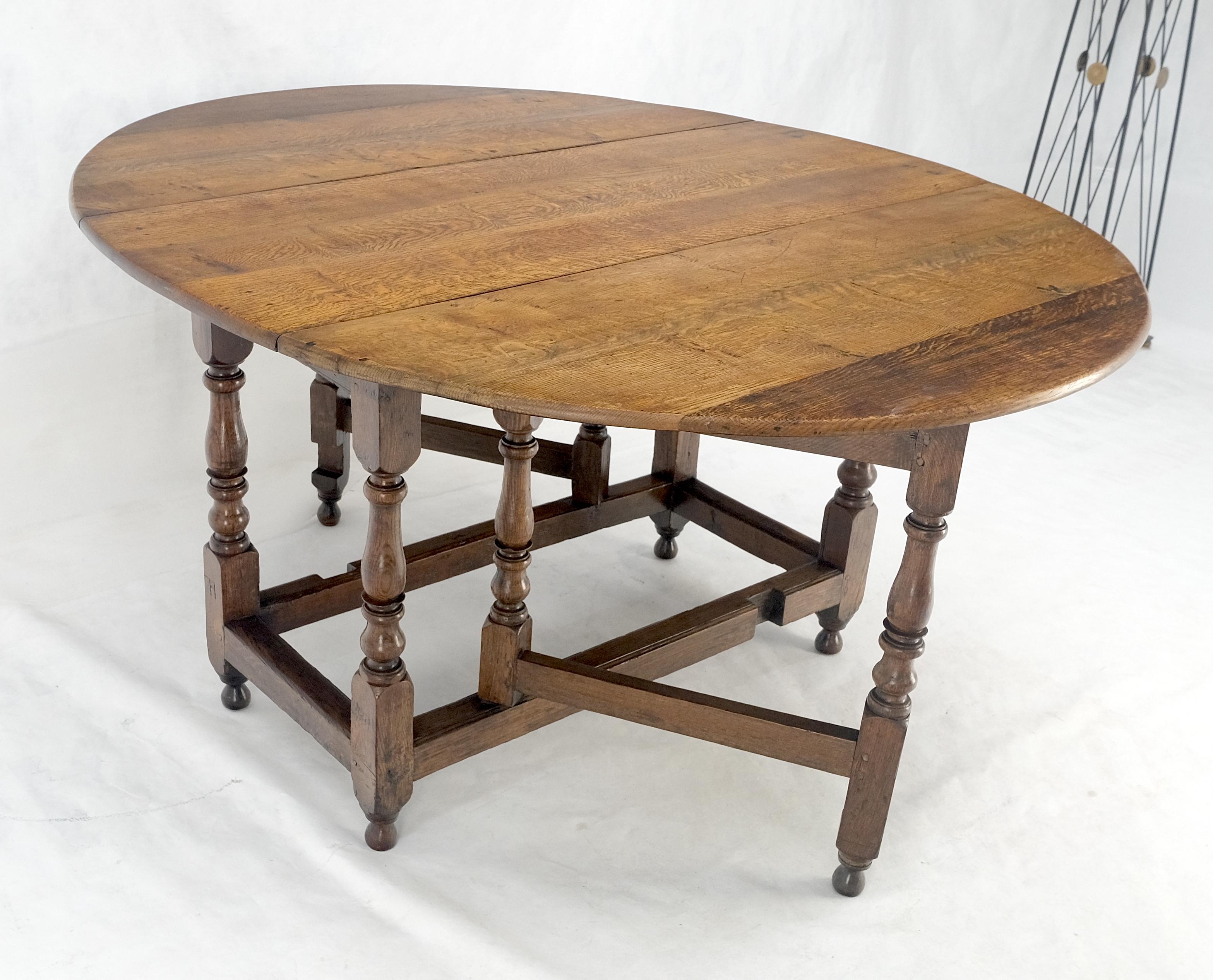 Mesa de Comedor con Pata de Portón de Hoja Abatible Ovalada de Roble Tigre Macizo ¡Limpia! en venta 12