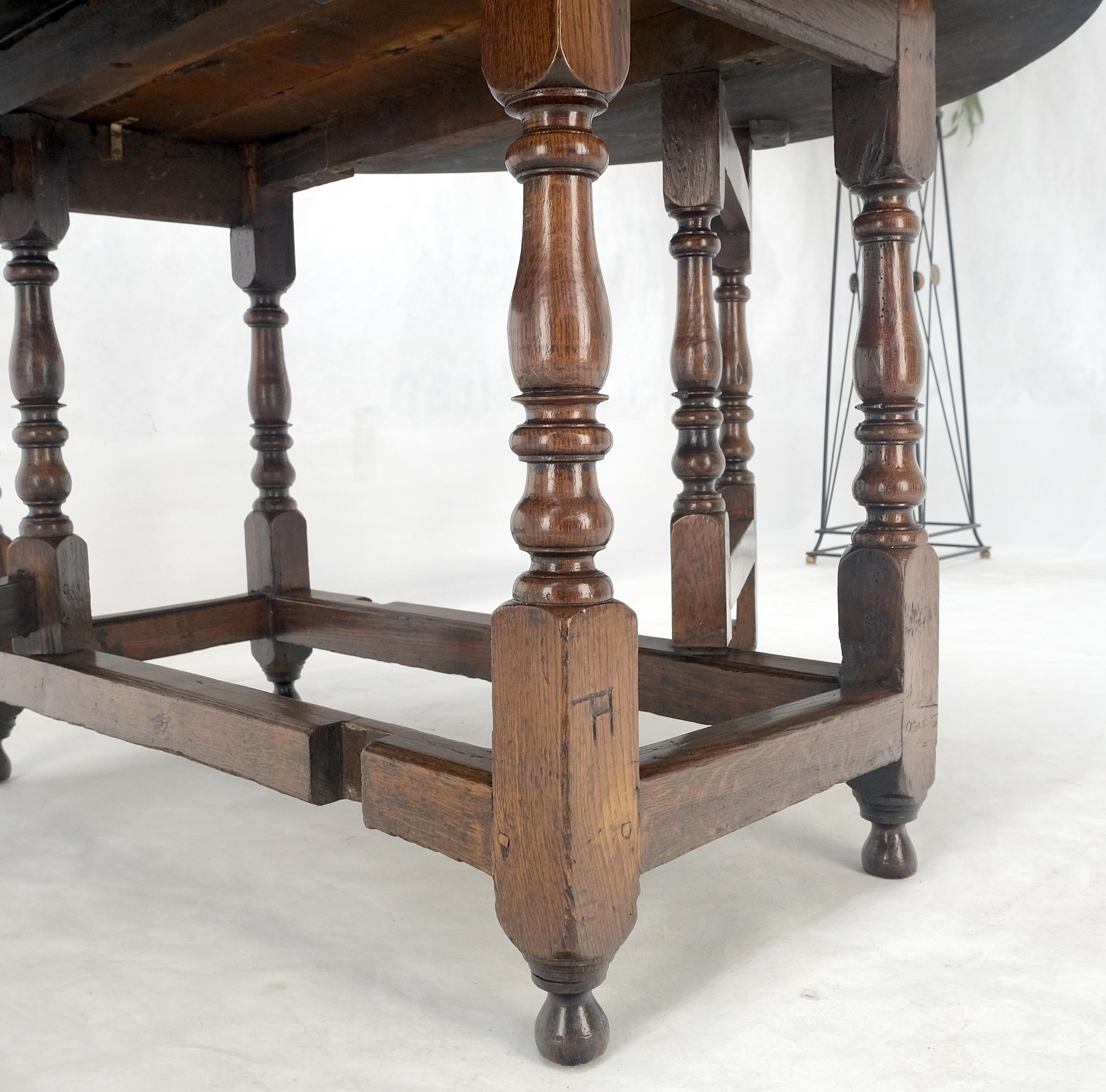 Mesa de Comedor con Pata de Portón de Hoja Abatible Ovalada de Roble Tigre Macizo ¡Limpia! Lacado en venta