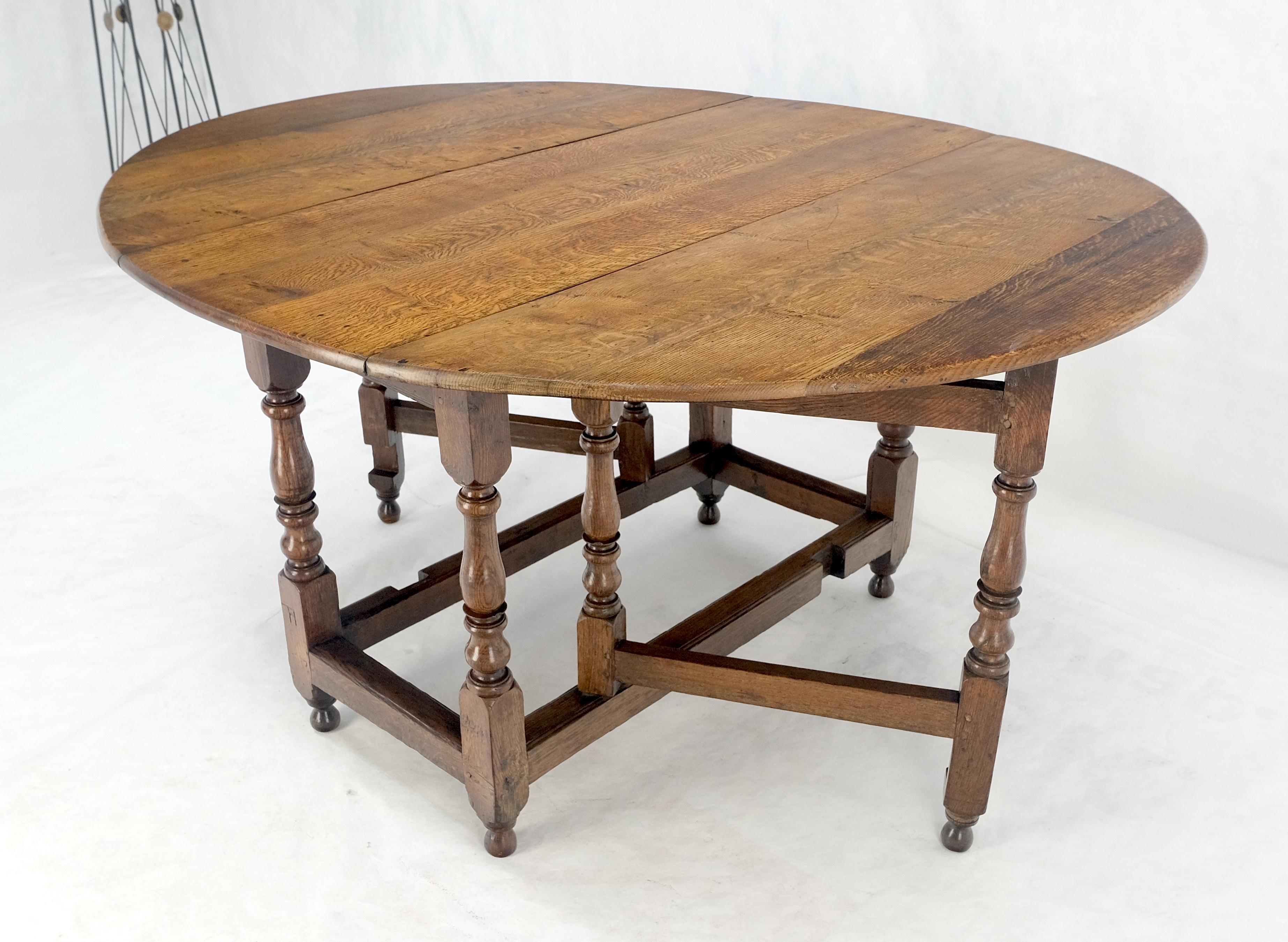 Mesa de Comedor con Pata de Portón de Hoja Abatible Ovalada de Roble Tigre Macizo ¡Limpia! en Bueno estado para la venta en Rockaway, NJ