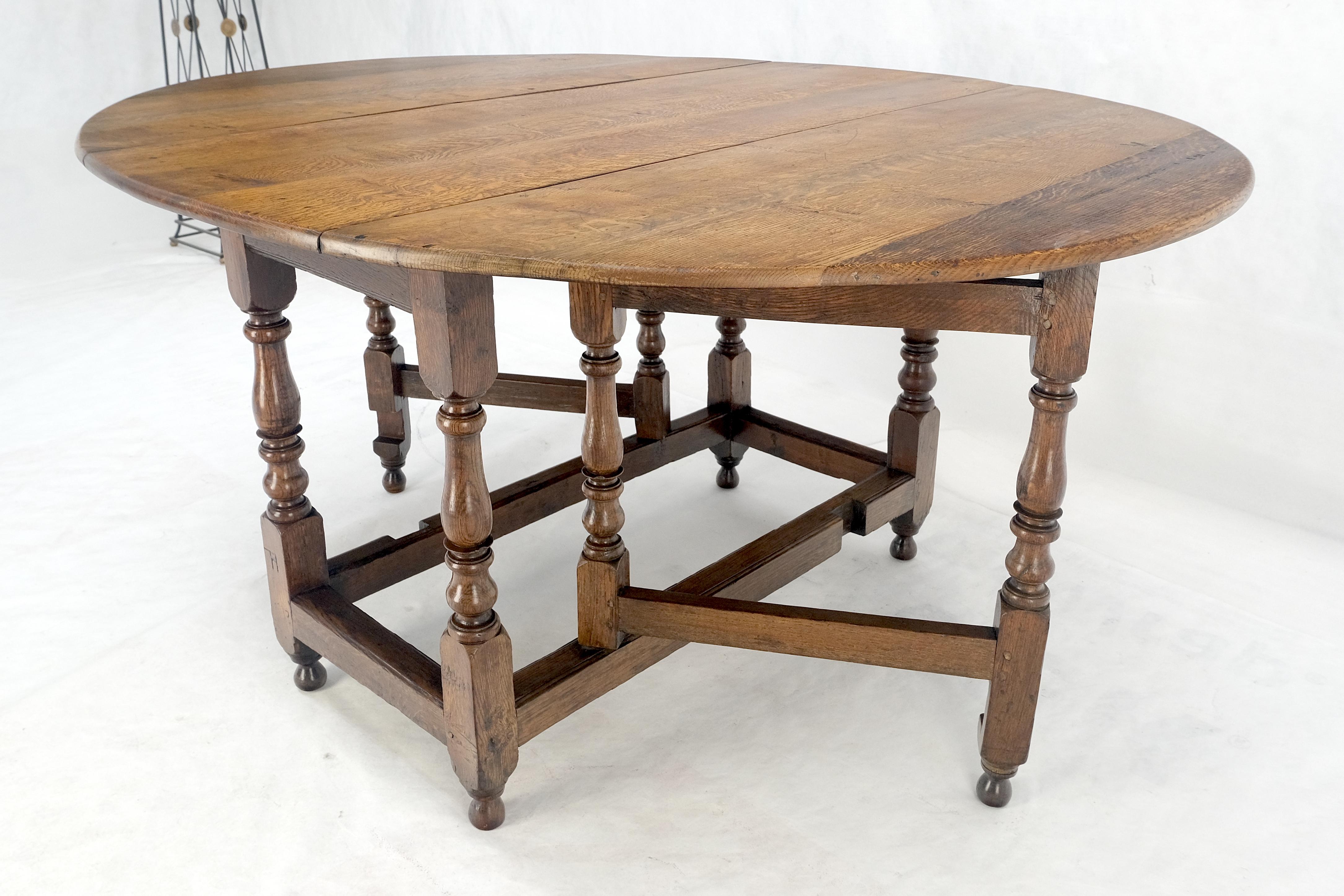 Mesa de Comedor con Pata de Portón de Hoja Abatible Ovalada de Roble Tigre Macizo ¡Limpia! en venta 2