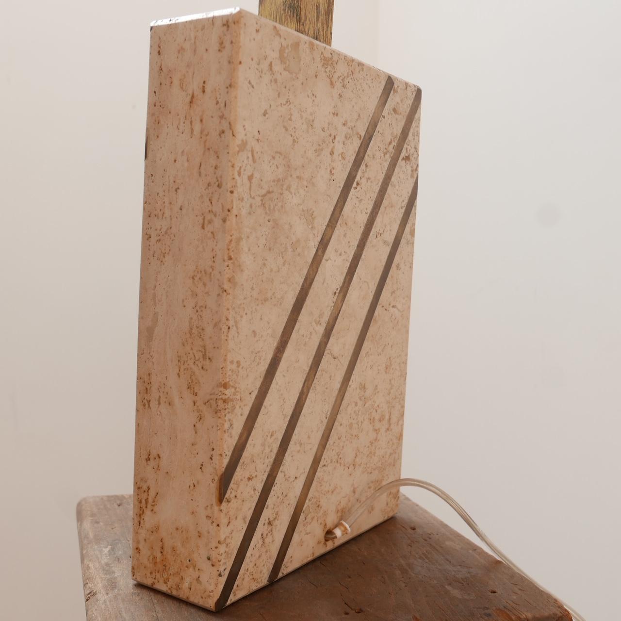 A stylish solid travertine table lamp with double sided strips of brass inlay,

Belgium, c1970s. 

Since re-wired and PAT tested. 

Dimensions: 46 H x 23 W x 7.5 D in cm.

Delivery: POA.

 