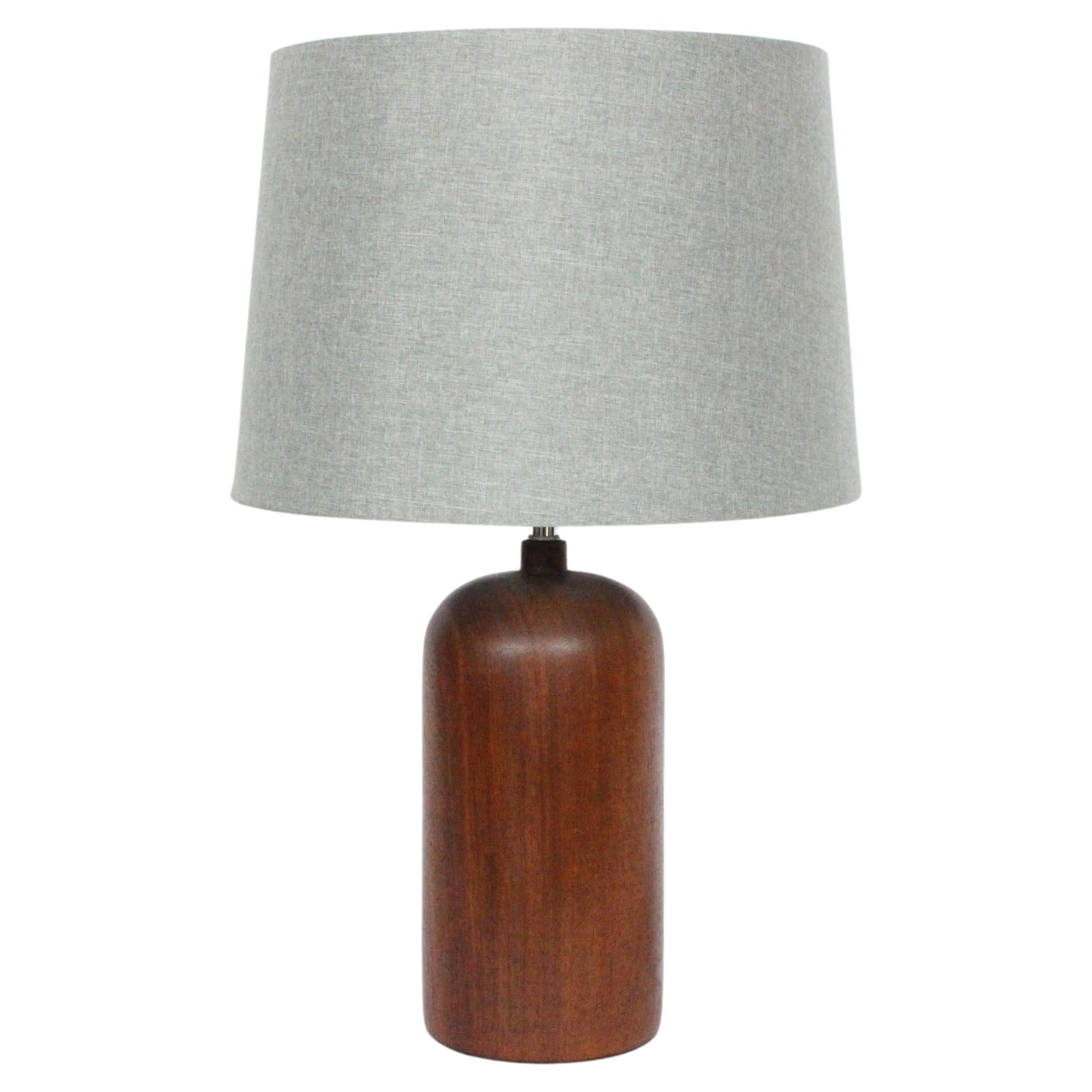 Danish Mid Century Modern Rounded Solid Dark Teak Table Lamp, 1960's For Sale