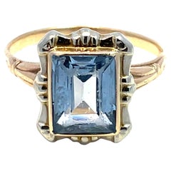 Solid Two-Tone Gold Emerald-Cut Blue Topaz Ring