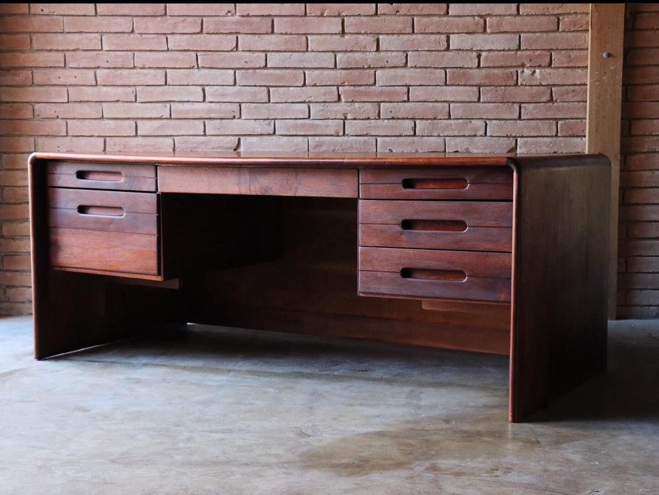 Beautiful solid walnut and olive Burlwood desk designed by Lou Hodges for California Design Group, 1980

This uncommon desk is a perfect example when form meets function. The solid walnut front and top is rich in color while the backside of the