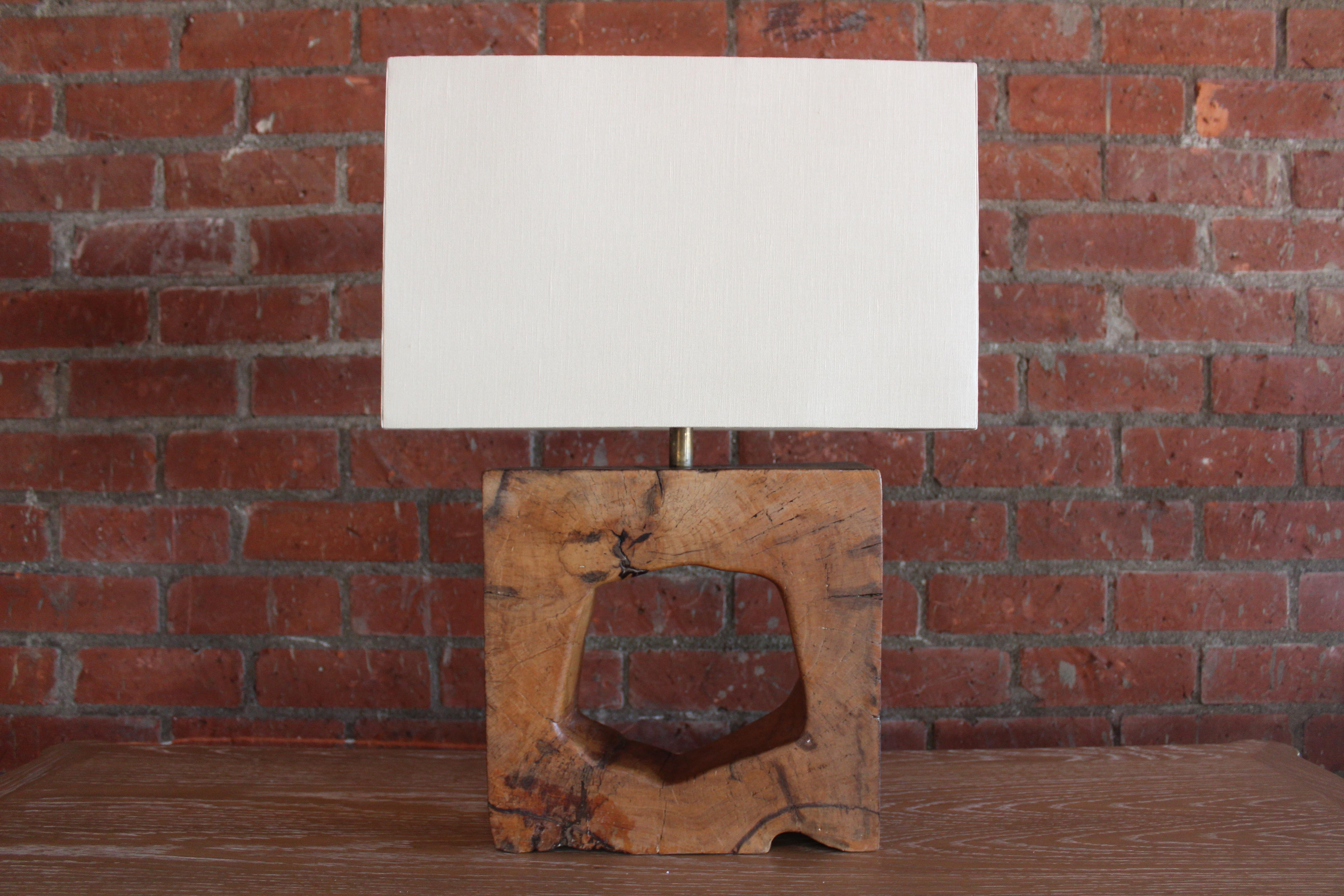 1960s Solid walnut cutout table lamp, France. Newly rewired and fitted with a custom shade in Belgian linen. 27