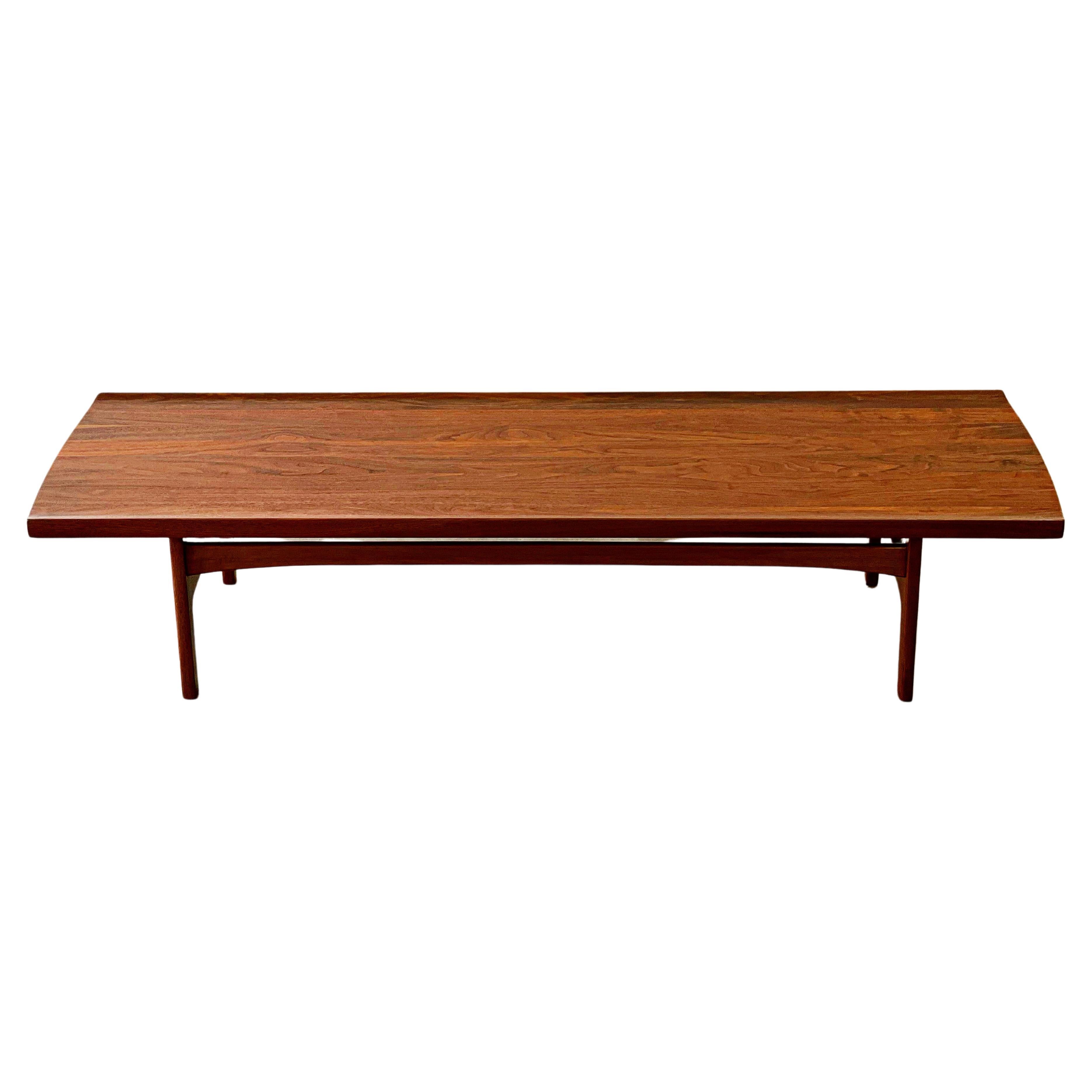 Rare solid walnut long coffee table by Tove and Edvard Kindt-Larsen for Dux, Swden circa 1960s. Staved solid walnut with contrasting beech wood inlayed joinery on either end. Stellar design, materials and craftsmanship.
Fully restored by our team