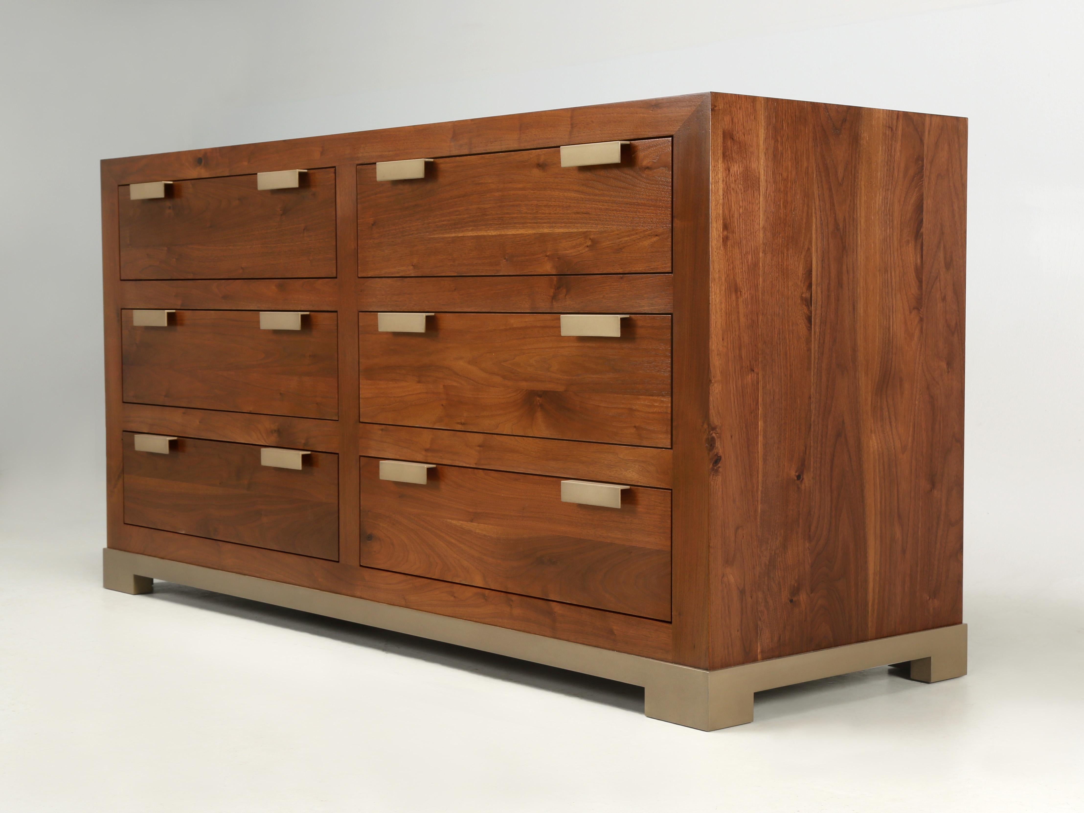 Hand-made to order in our Chicago Old Plank woodworking department, is this absolutely gorgeous chest of drawers or dresser if you please. Look carefully and you will notice that the grain of the thick rich solid walnut is continuous across the top