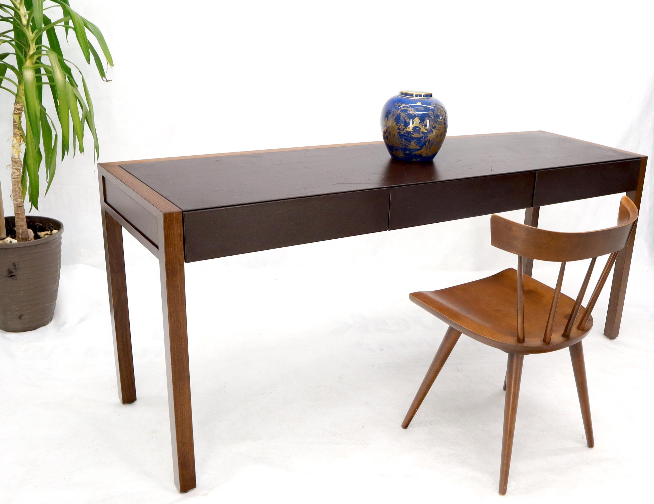 Mid-Century Modern three drawers narrow desk console lobby hall entry table. Multiple uses versatile high quality solid walnut construction lobby desk.