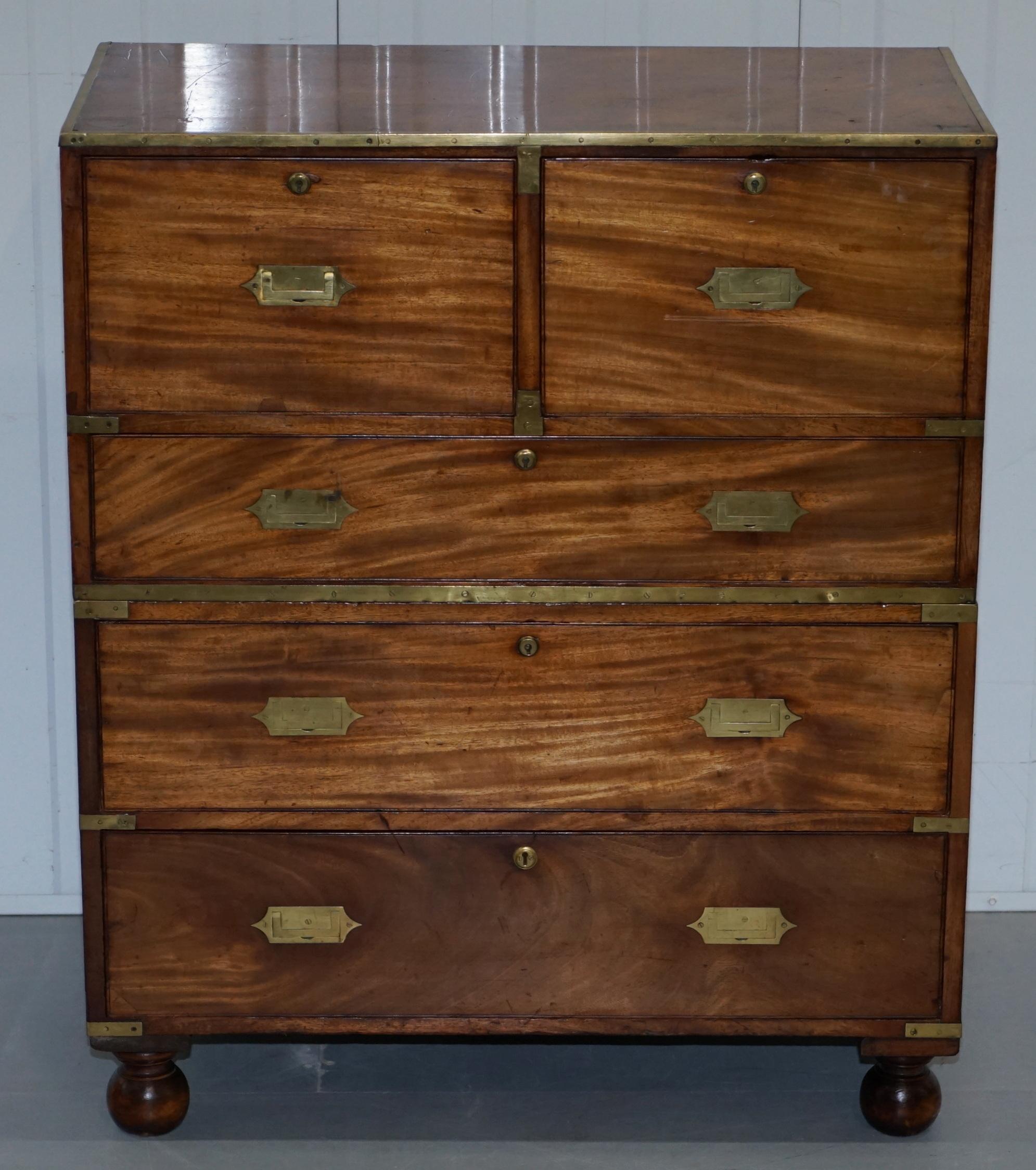 We are delighted to offer for sale lovely very rare solid Walnut with brass trim Military officers campaign chest of drawers, circa 1870 

A genuine and very well used old set of campaign drawers, these unlike most of the fake reproduction pieces