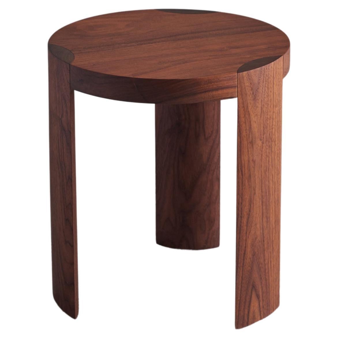 Solid walnut Rota side table three legged in modernist style For Sale