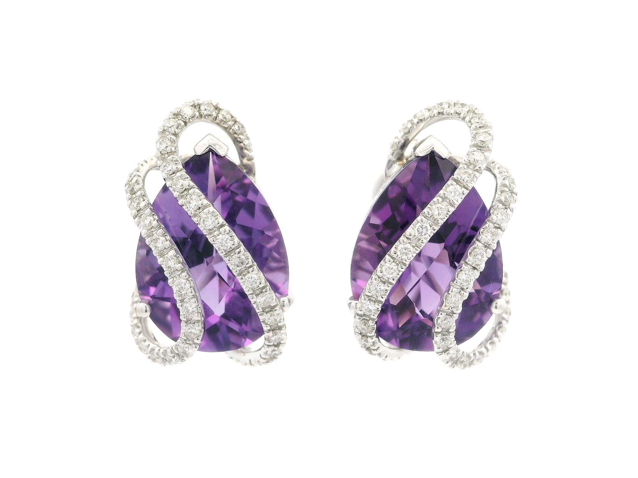 –Stone(s)–
(2) Natural Genuine Amethysts - Pear Checkerboard Cut - Prong Set - Rich Purple Color - 16x12mm (approx.) - 16ctw (approx.)
(42) Natural Genuine Diamonds - Round Brilliant - Prong Set - G/H Color - VS2/SI1 Clarity - 0.35ctw