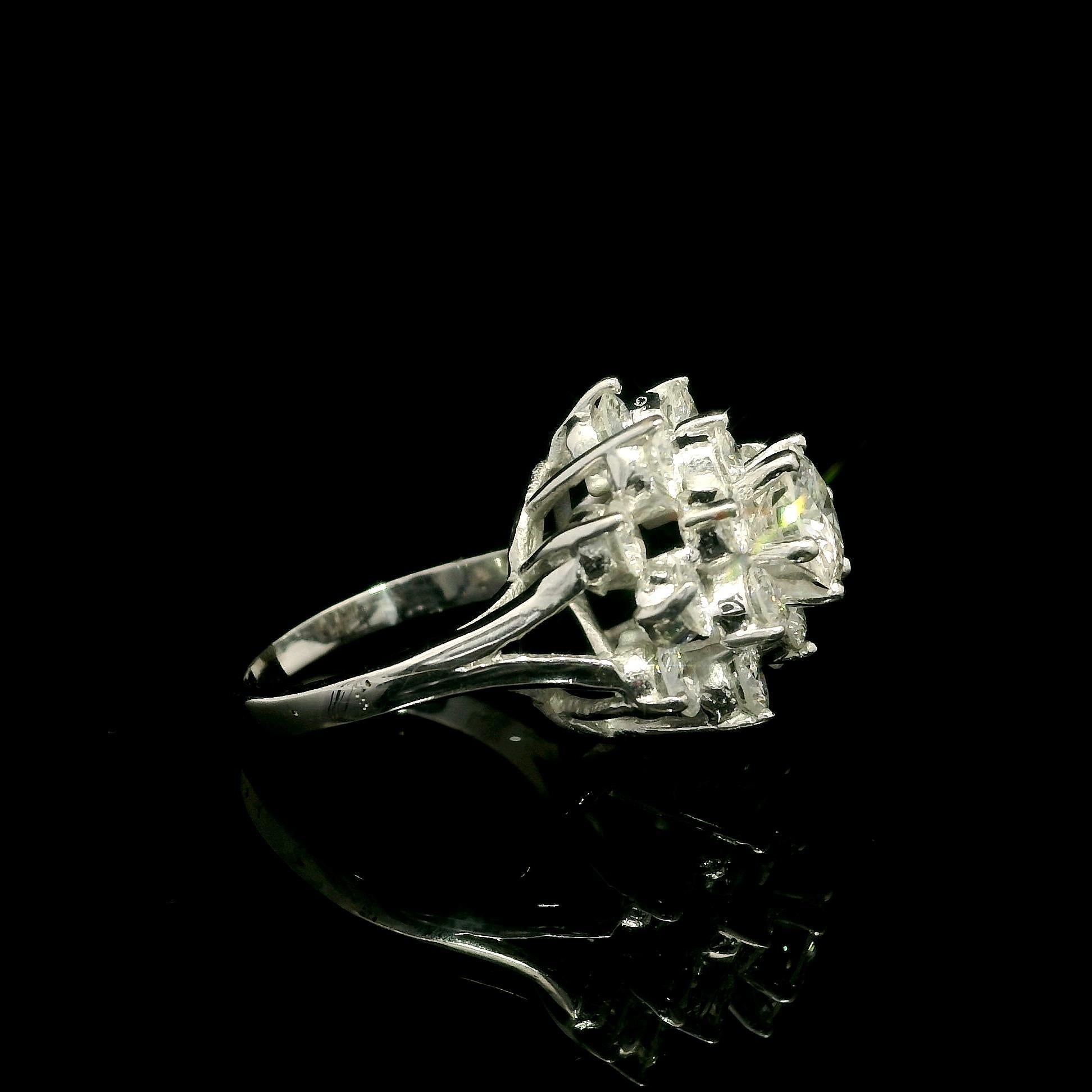--Pierre(s) :...
(1) Diamant véritable naturel - taille ronde brillante - serti - couleur G - pureté I1 - 6,17 mm - 0,91 ct (environ)
(18) Diamants naturels authentiques - taille ronde brillante - sertis - Brilliante - couleur G/H - pureté SI1-I1 -