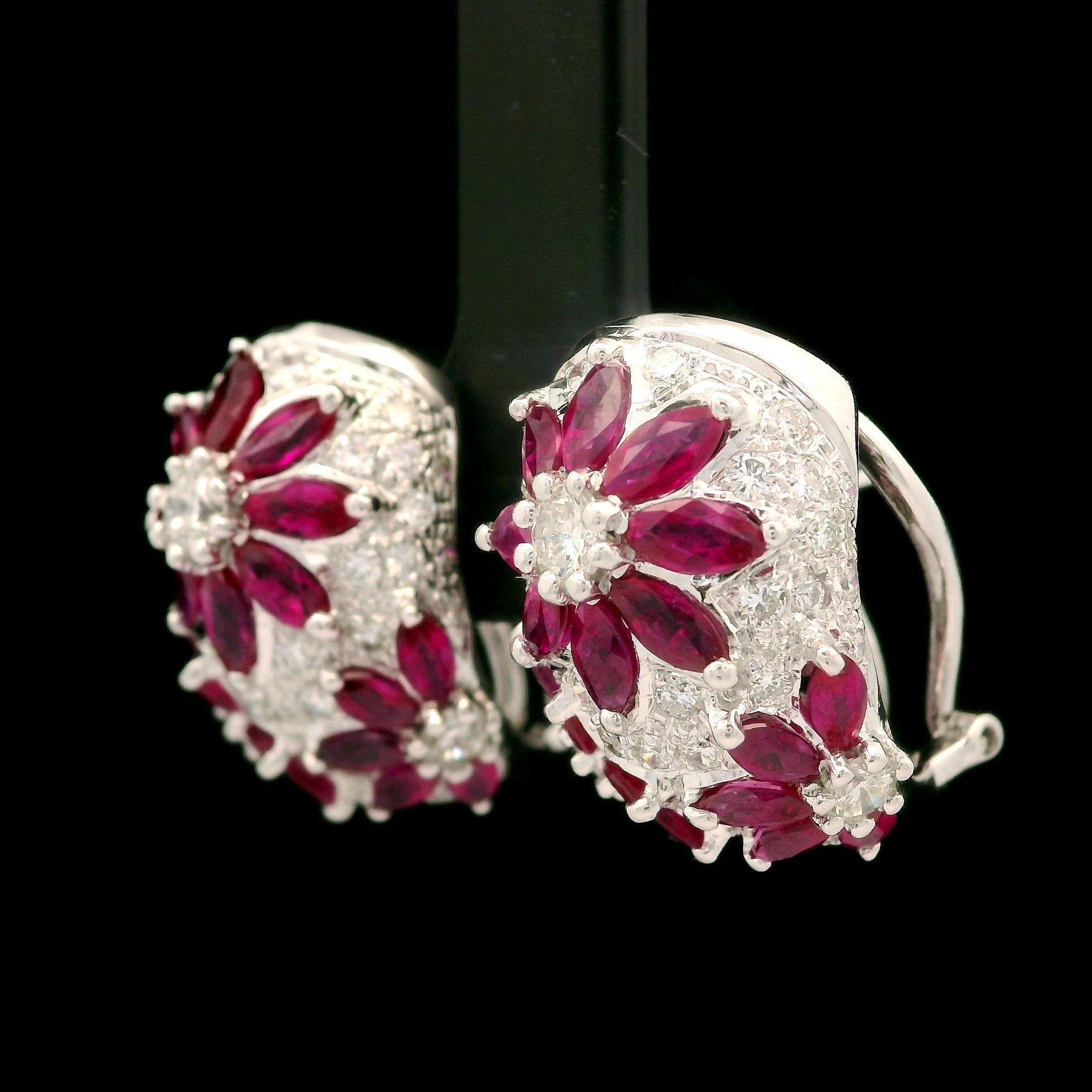 --Stone(s):--
(32) Natural Genuine Rubies - Marquise Cut - Prong Set - Vivid Slightly Pink Red Color - 3.10ctw (approx.)
(72) Natural Genuine Diamonds - Round Brilliant Cut - Prong & Pave Set - G-I Color - VS1-SI2 Clarity - 1.0ctw (approx.)
Total