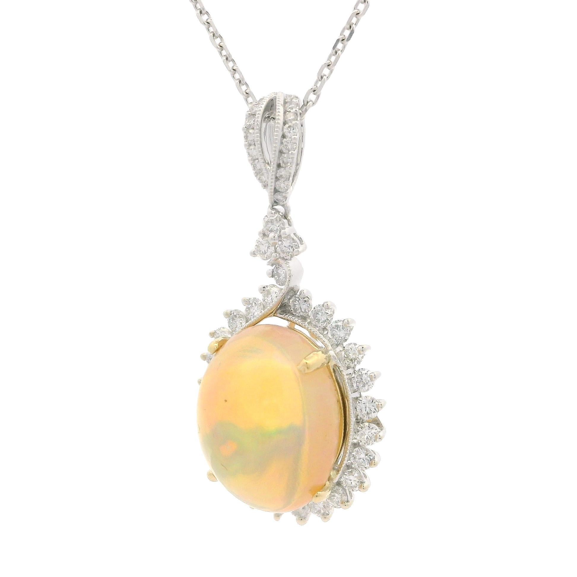 –Stone(s)–
(1) Natural Genuine Opal - Oval Cabochon Cut- Prong Set - Very Nice Large Opal - White Base w/ Nice Color Play - 14.05x11.18mm (approx.)
(44) Natural Genuine Diamonds - Round Brilliant - Prong Set - G-I Color - VS2-SI2 Clarity - 0.72ctw